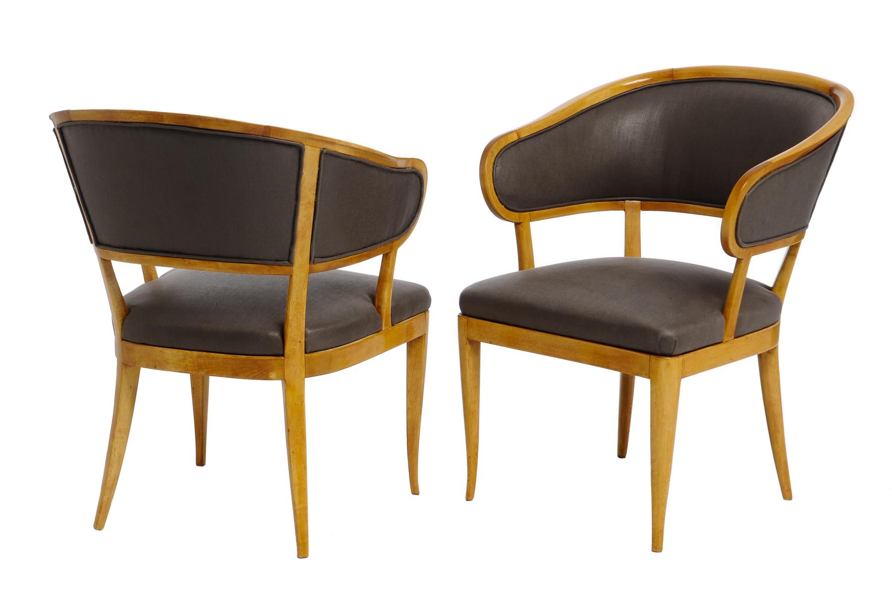 A pair of Swedish birchwood and upholstered Jonas Love armchairs, by Carl Malmsten, circa 1940s, with a generous barrel back, drop in upholstered seats raised on tapered and chamfered legs. Brand stamped CM. 
Rogers & Goffigon glazed linen