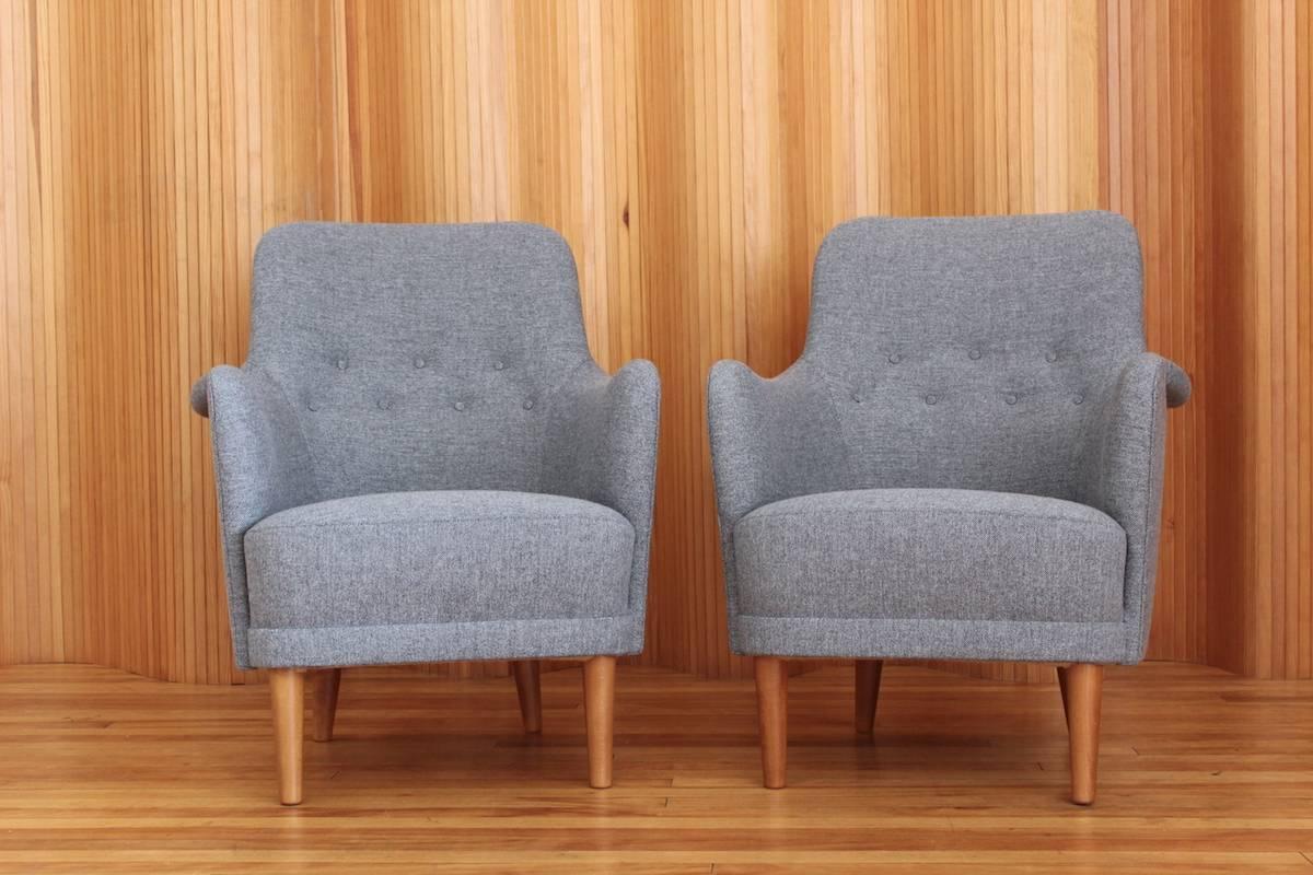 Stunning pair of 'Samsas' lounge chairs. Lovely organic shape, wonderful detailing and incredibly comfortable. The legs are a natural beech. 'Samsas' translates as 'togetherness'.

I have more chairs in stock waiting to be reupholstered. Please