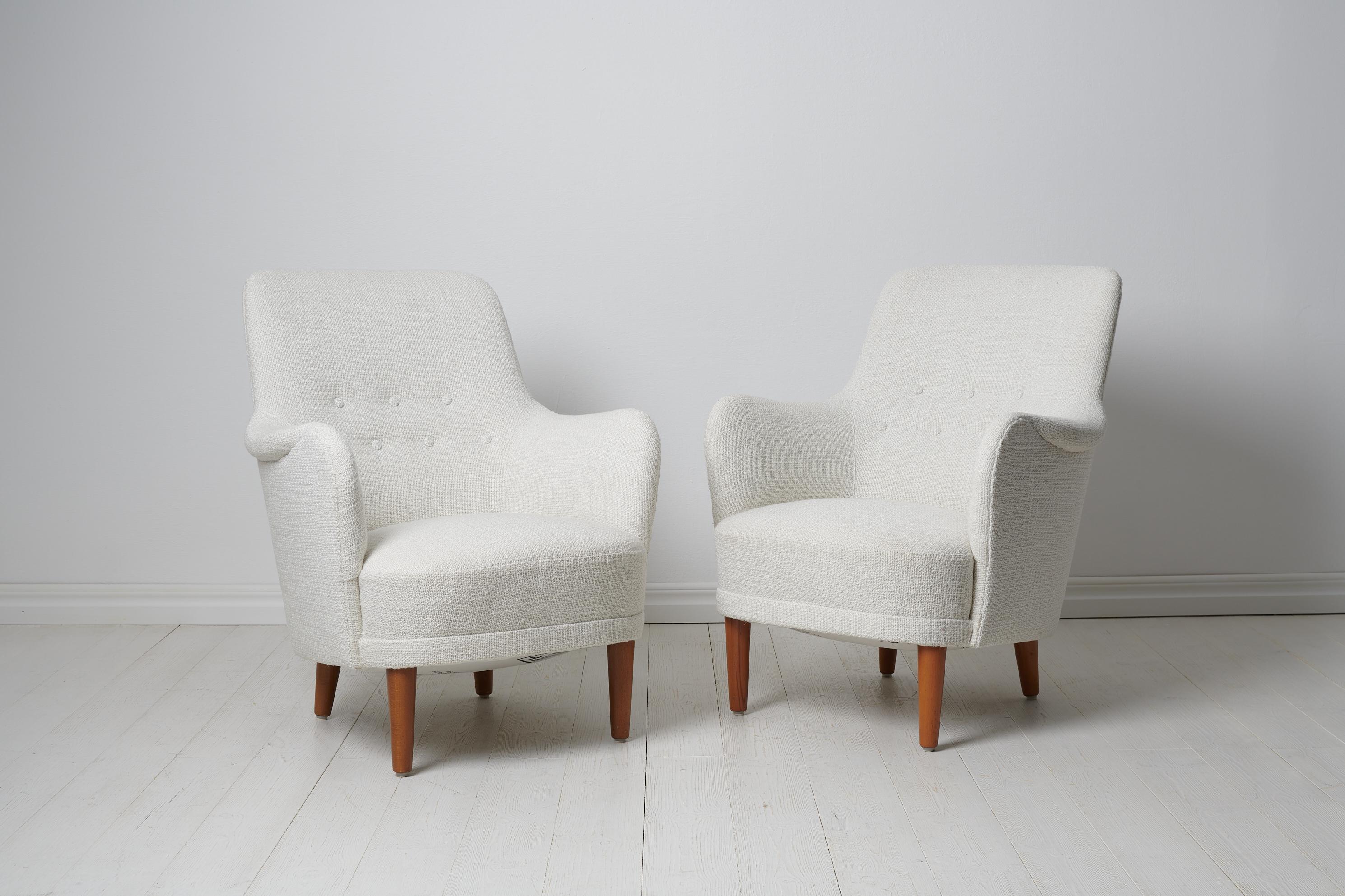 Carl Malmsten Samsas armchairs for O.H. Sjögren from the mid 20th century. The chairs are a Swedish modern classic and the Samsas series is today recognised as the most characteristic designs from Malmsten. The armchairs Samsas is a 1960s favourite