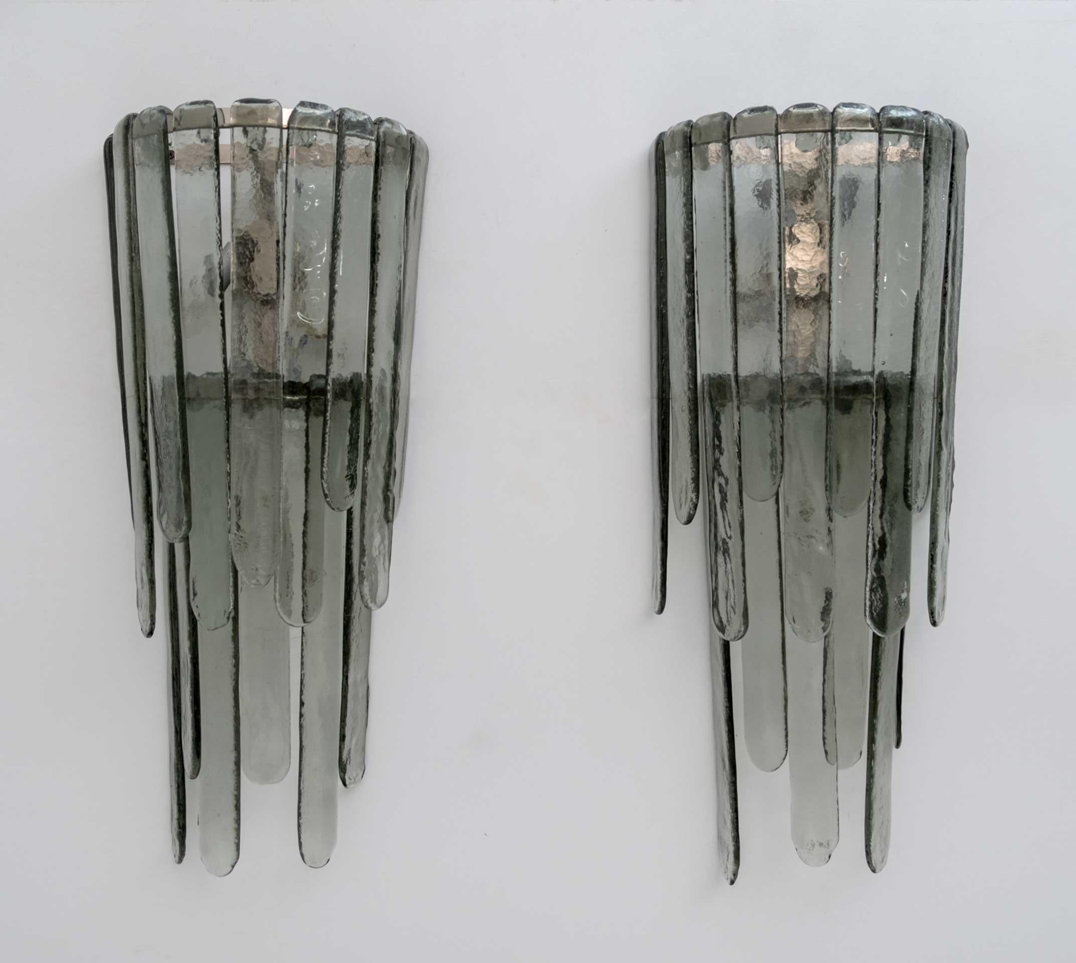 Pair of chiseled smoked Murano glass wall lamps, by Carlo Nason for Mazzega Mod. 