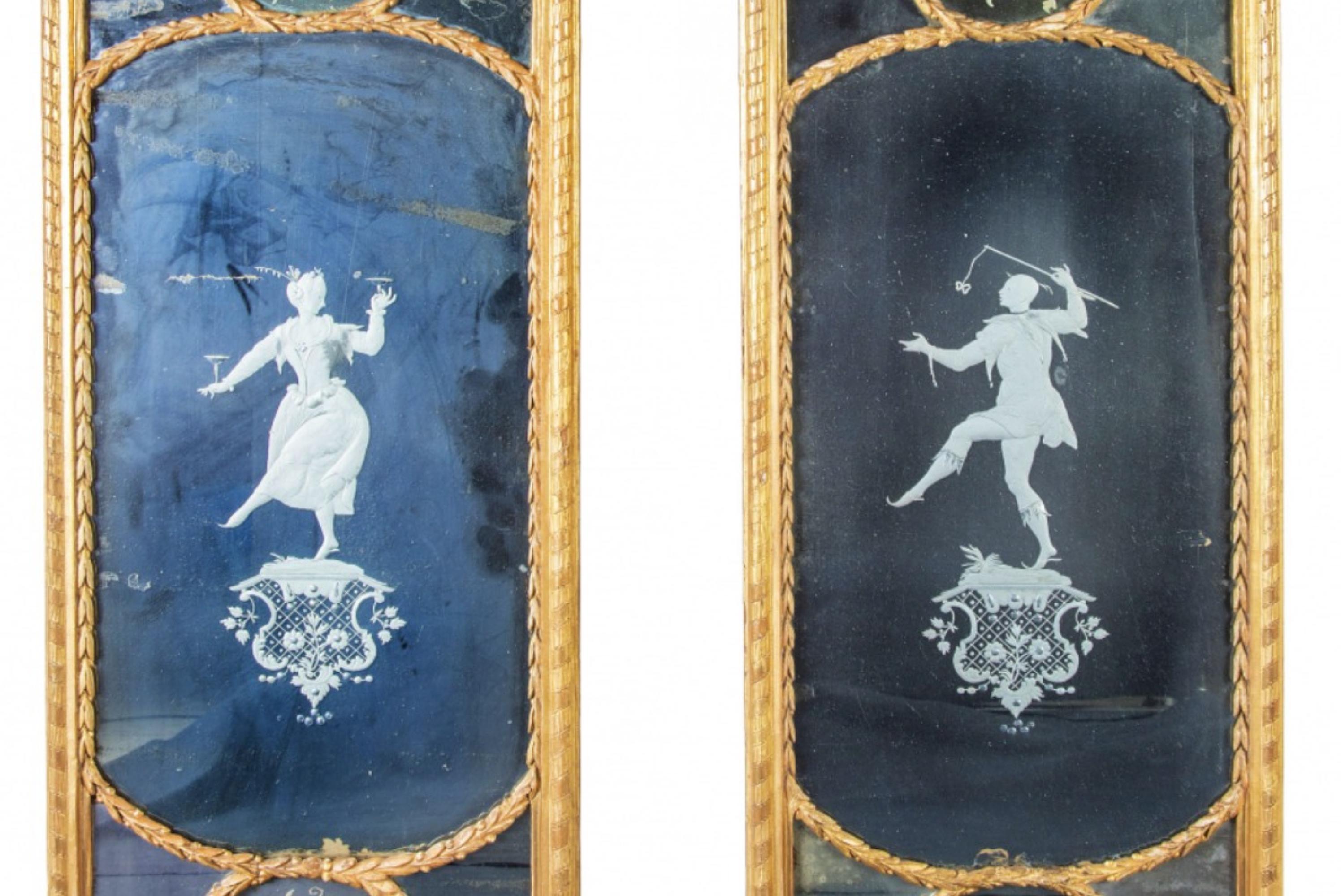 Pair of Carlos IV style mirrors in carved, stuccoed and gilt wood, acid-etched decoration with two dancers.
Spain, S. XIX.

Measurements: 141 x 47 cm.