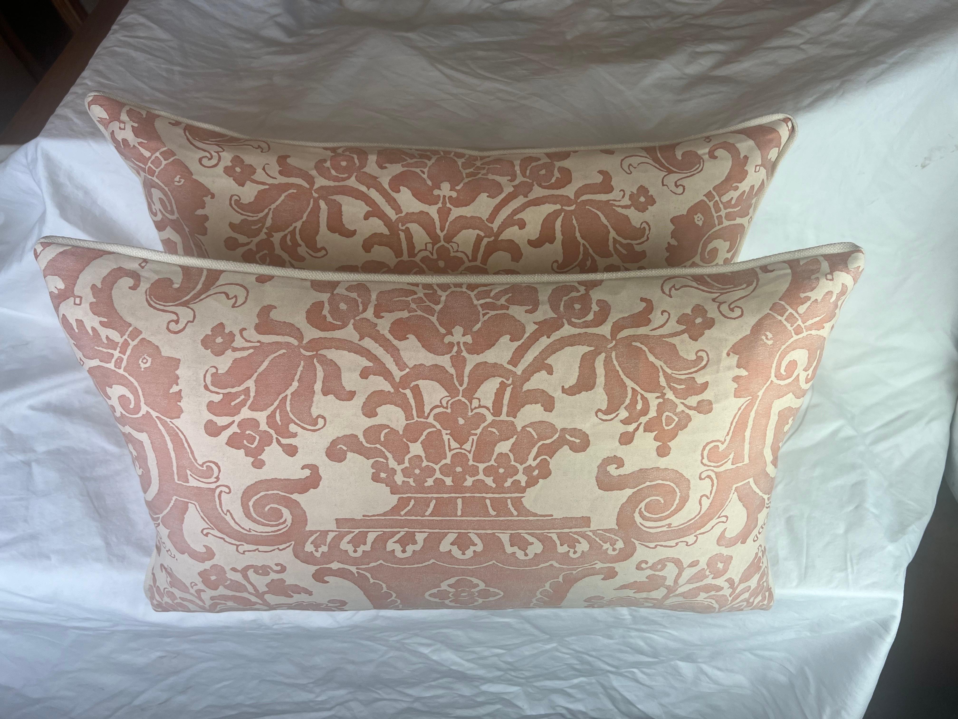 Pair of custom Carnavalet patterned Fortuny textile pillows in pink & cream.  The 17th Century inspired French design-with magnificent and intricate garden urns abundant with flowers-is framed by lavish cornucopia & elaborate scrolling swags. 