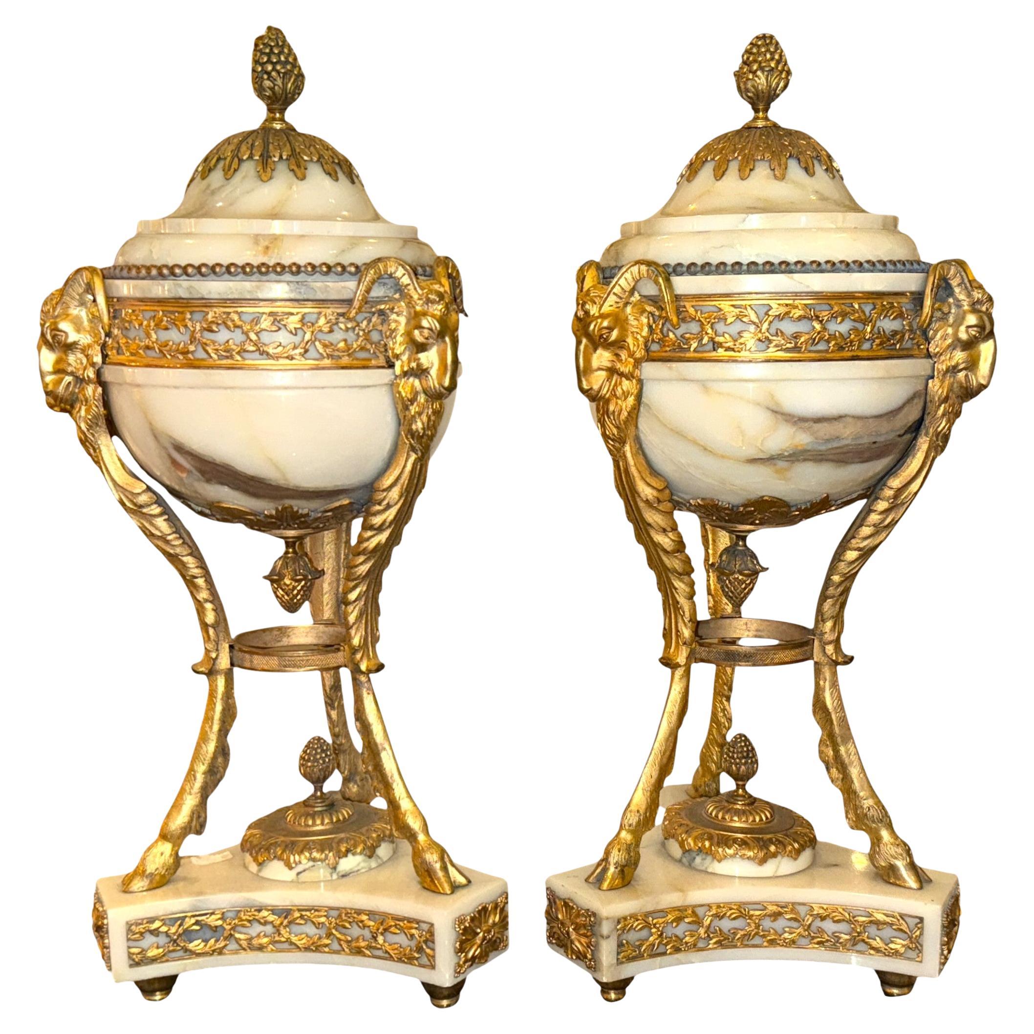 Pair of Carrara Marble Cassolettes with Gilt Bronze Ram’s Head, 19th Century