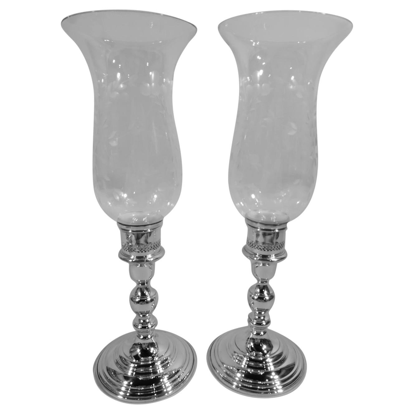 Pair of Cartier American Sterling Silver and Glass Hurricane Lamps