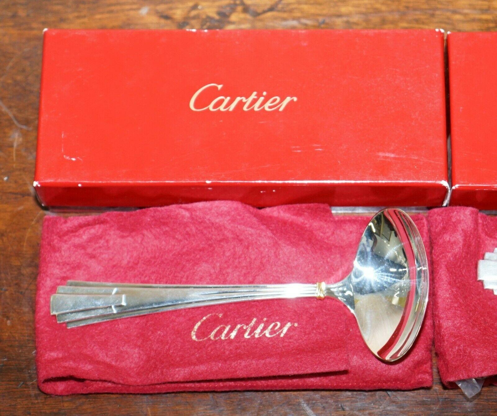 Wimbledon-Furniture

Wimbledon-Furniture is delighted to offer for sale this stunning pair of brand new Solid Sterling silver with gold accents and boxed Cartier La Maison De Louis gravy ladles

These are part of a suite, in total I have the large