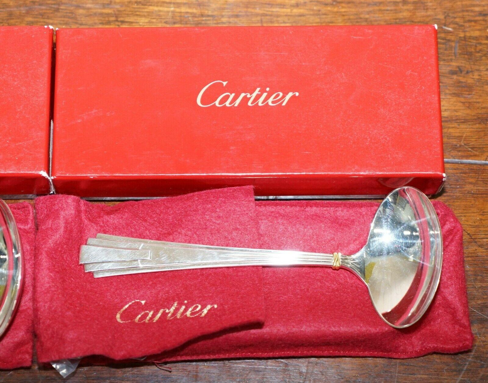 Art Deco Pair of Cartier Solid Sterling Silver and Gold Gravy Ladles