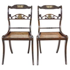 Pair of carved 19th Century Regency inlaid chairs