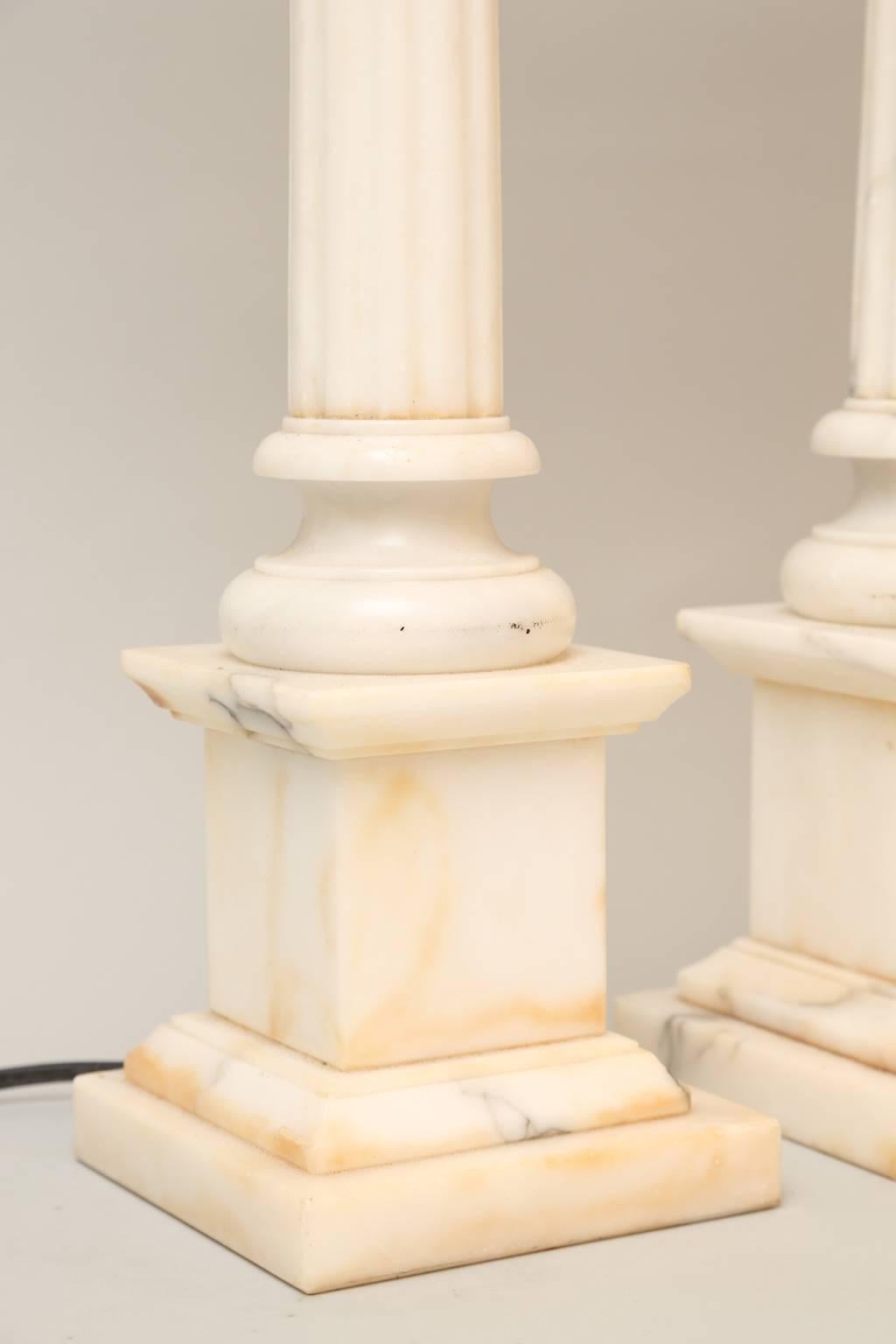 Mid-20th Century Pair of Carved Alabaster Columnar Form Table Lamps