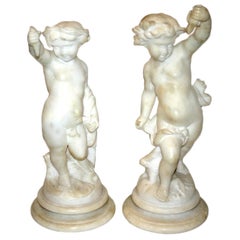 Pair of Carved Alabaster Putti