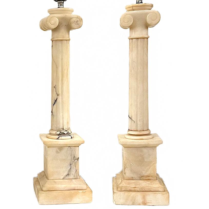 A pair of circa 1920's Italian carved alabaster table lamps.

Measurements:
Height of body : 21