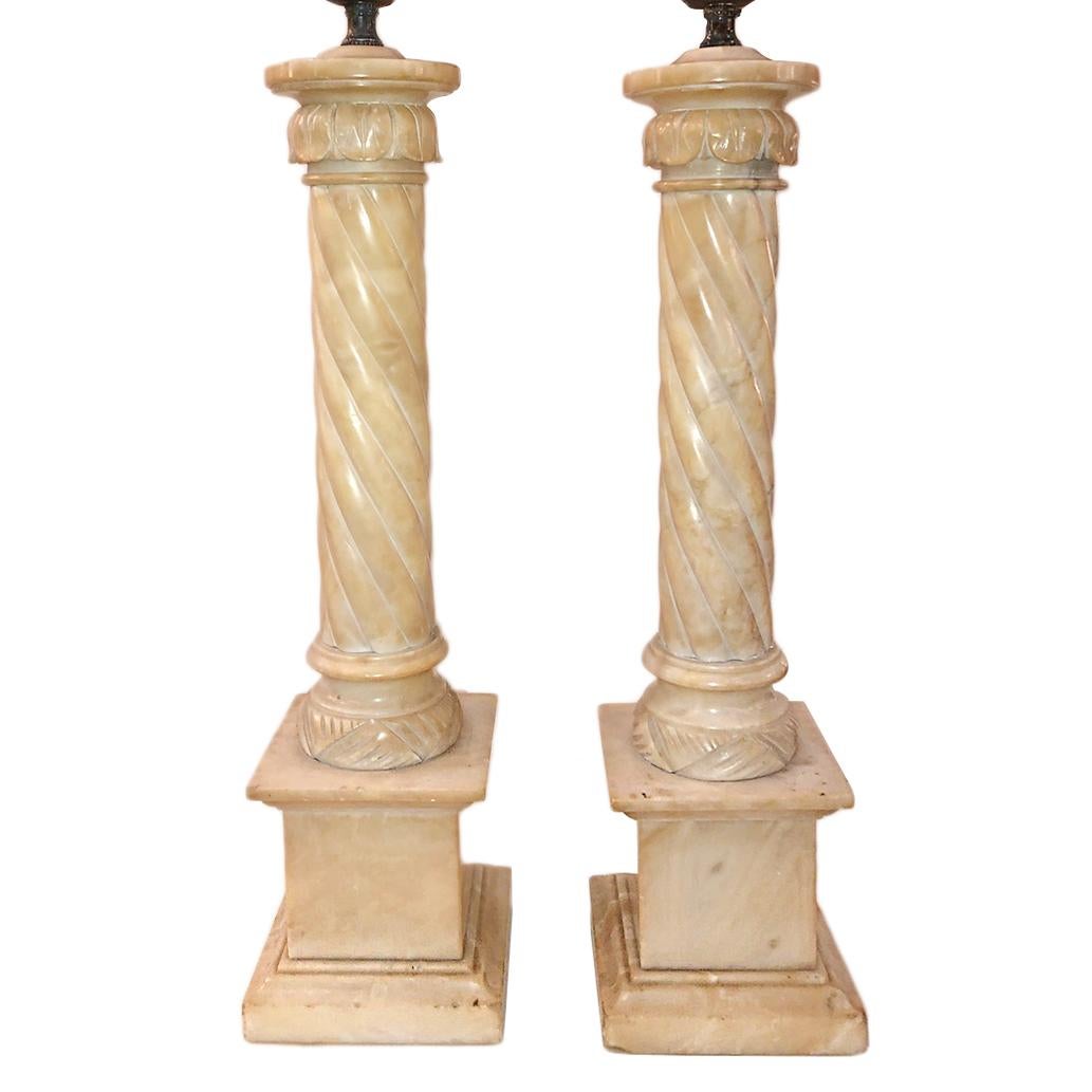 A pair of circa 1930s Italian hand carved table lamps. 

Measurements:
Height of body 21