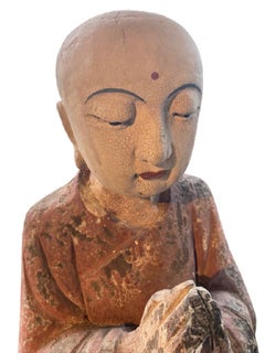 Pair of Carved and Decorated Wooden Praying Buddha Statues