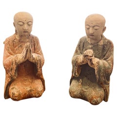 Pair of Carved and Decorated Wooden Praying Buddha Statues