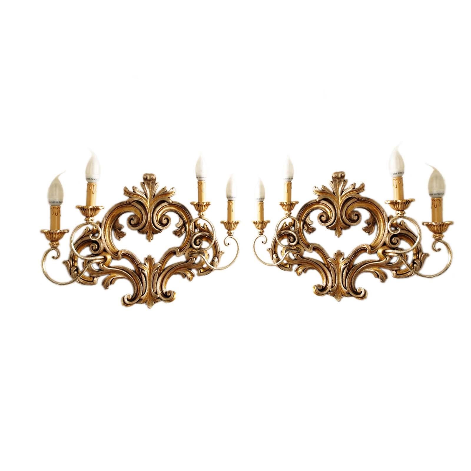 Early 20th Century Large Pair of Ornamental Carved and Gilded Wood Sconces, Venetian work by Testolini Freres. Their harmony and elegance makes your environment precious.
The electrical system has been overhauled and is working: ready for use

