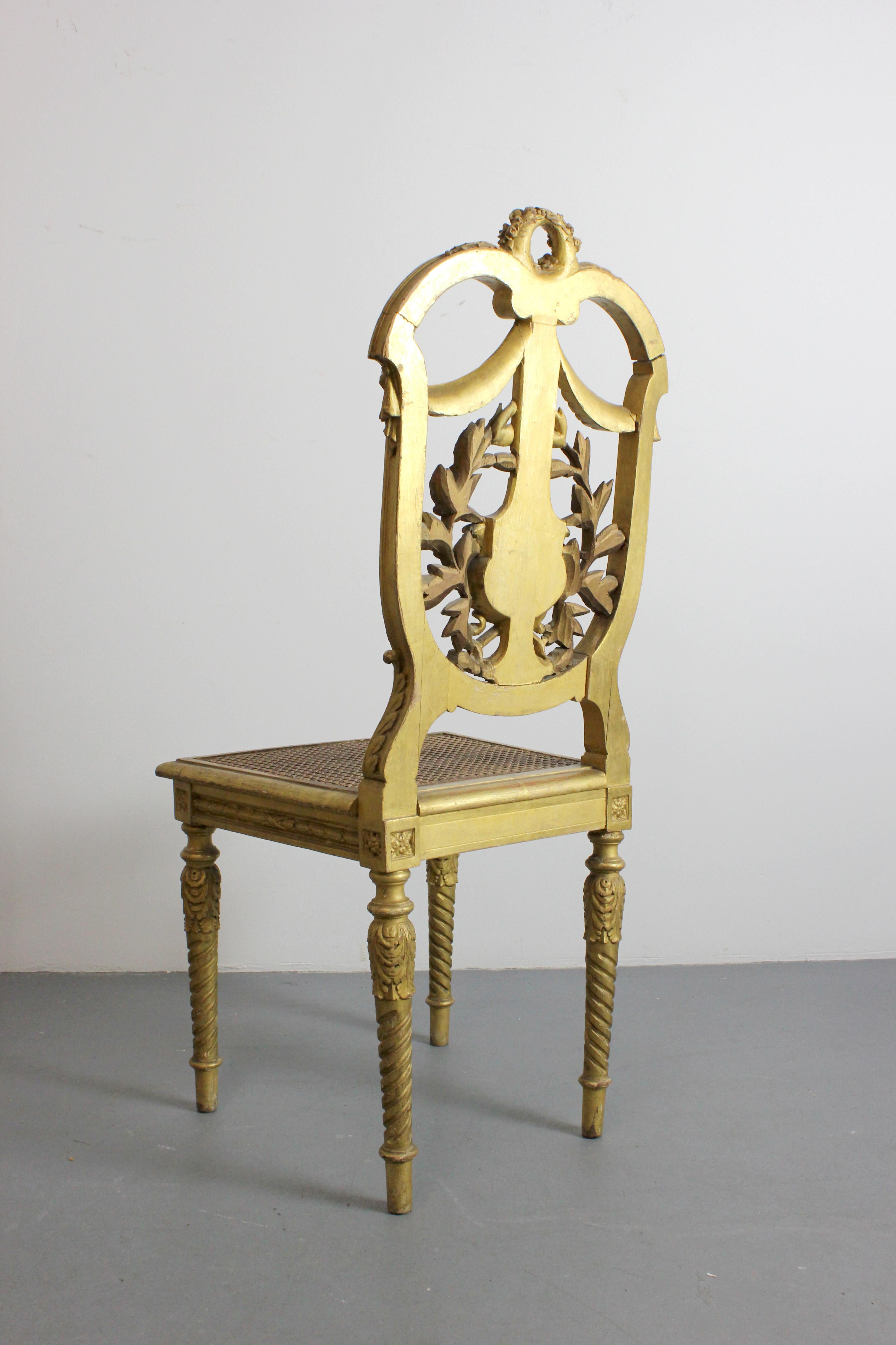 Pair of carved and gilded wooden chairs with lattice seat - Louis XVI - For Sale 1