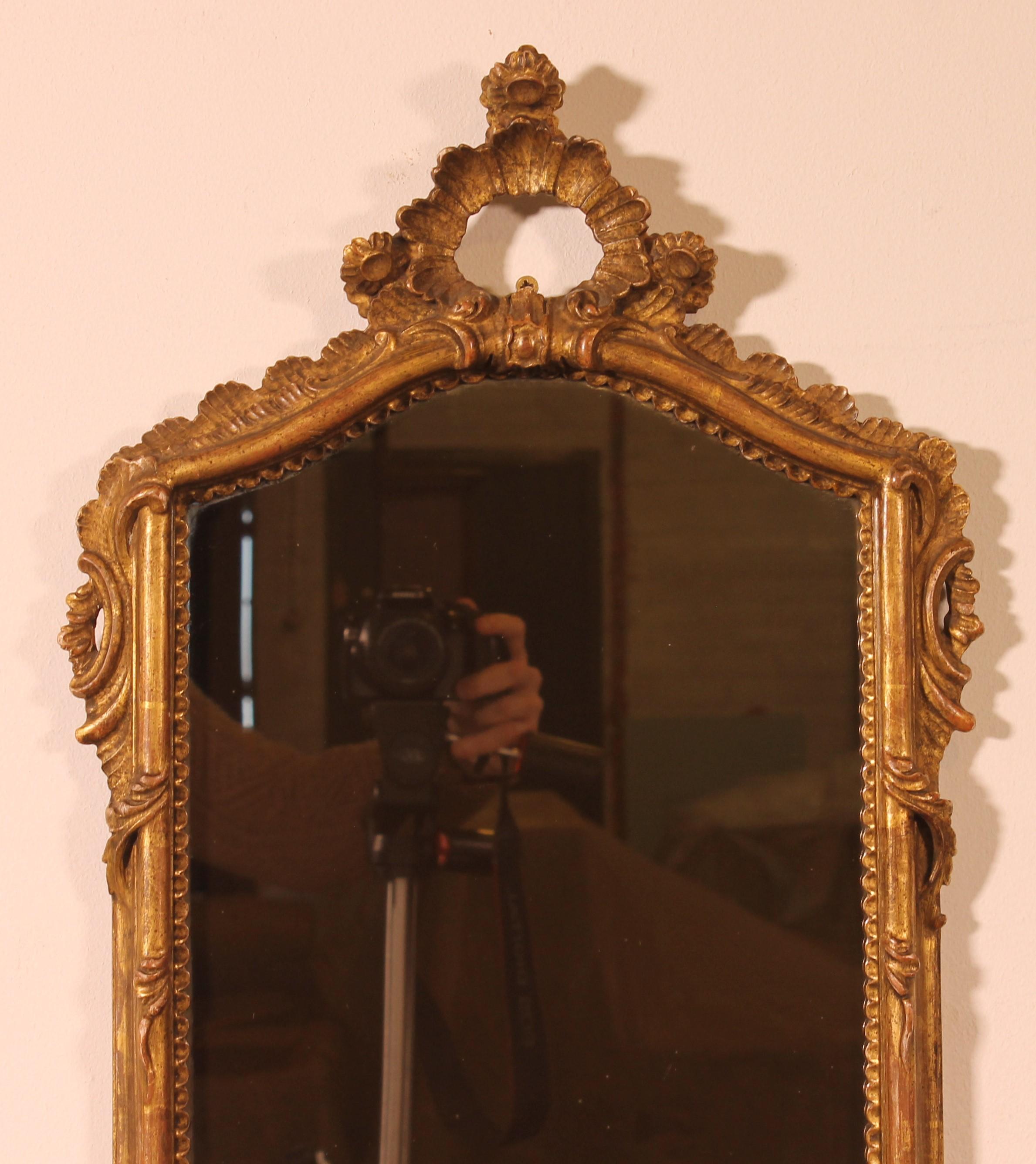 20th Century Pair Of Carved And Gilded Wooden Mirrors