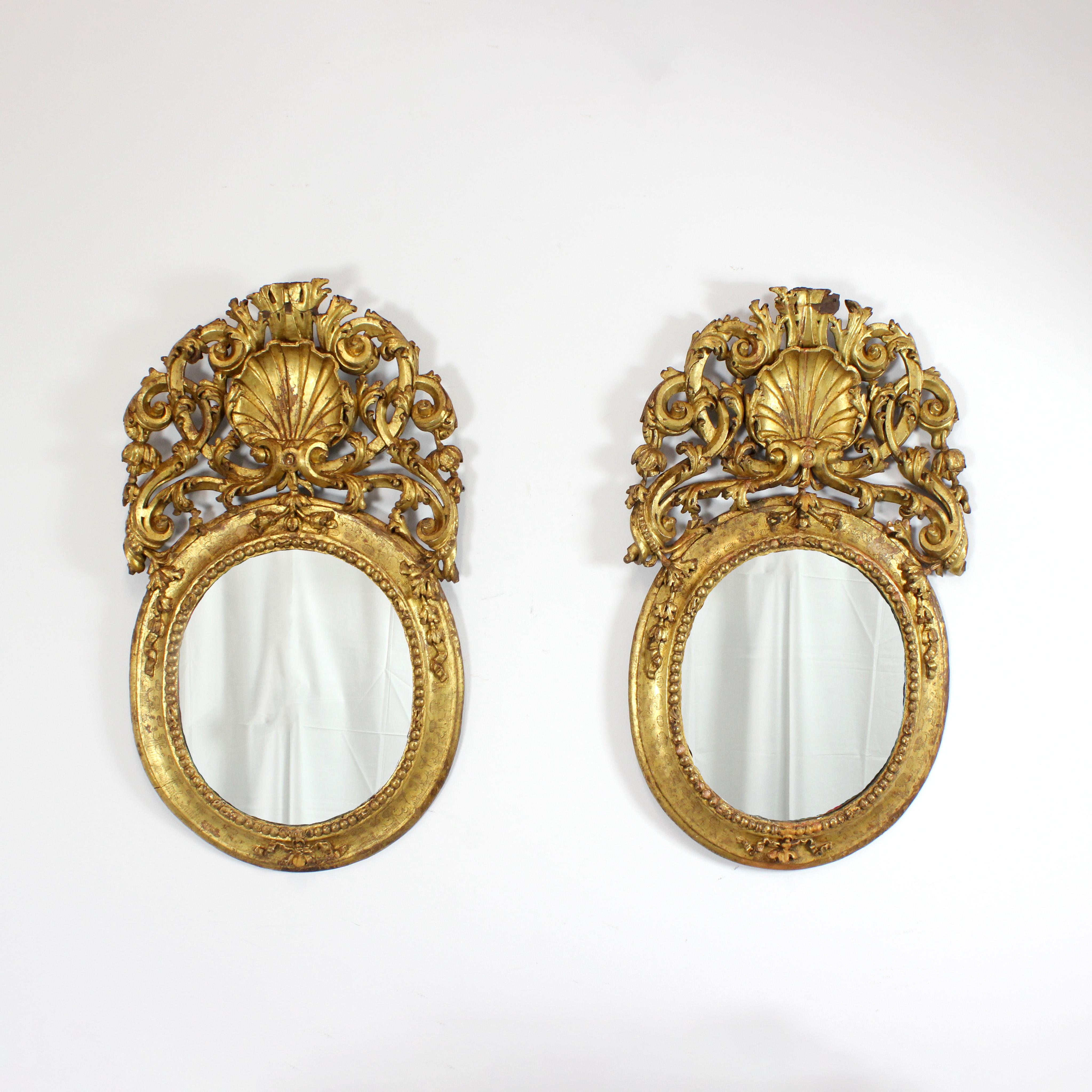 Pair of carved and gilded wooden sacristy mirrors - 18th century - Spain

Dimensions: 105 x 60 x 5 cm