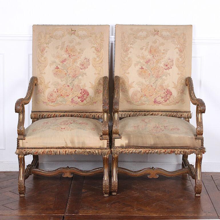 Pair of carved and gilt renaissance revival armchairs, C.1900.