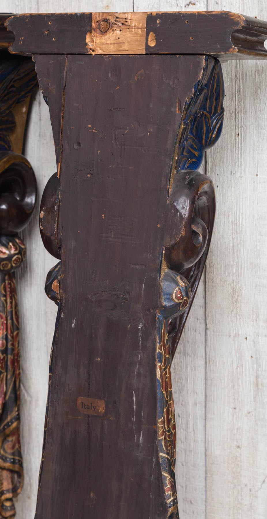 Pair of Carved and Painted Wood 