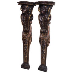 Pair of Carved and Painted Wood "Devilish" Pilasters