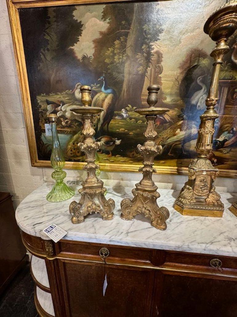 Nice pair of Italian antique carved and parcel gilt altar sticks. Makes a gorgeous accessory! Circa 1870.
26h x 10w