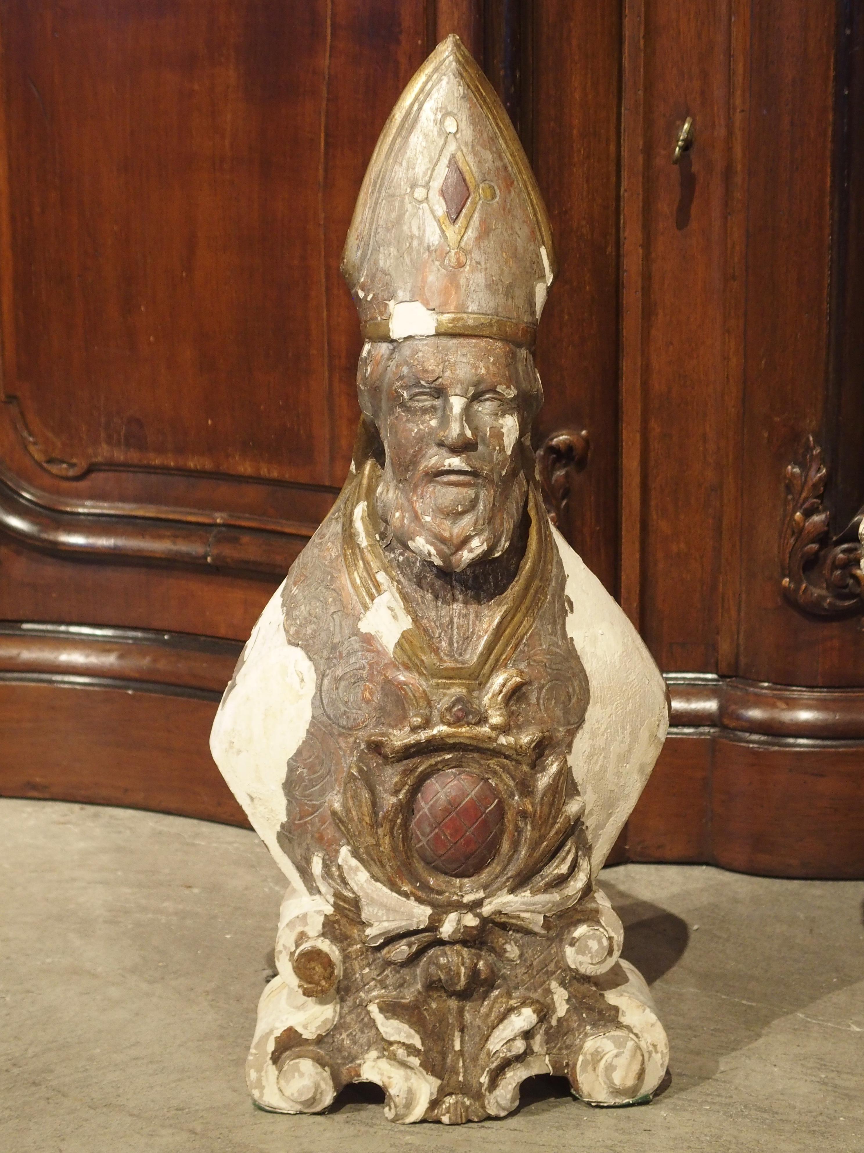 This rare pair of silvered bishop busts dates to the 1600s. They are from a church in Lazio, Italy, and based on their size, they were likely from a side altar. They are carved from wood, with a layer of gesso to bind the original silvering and