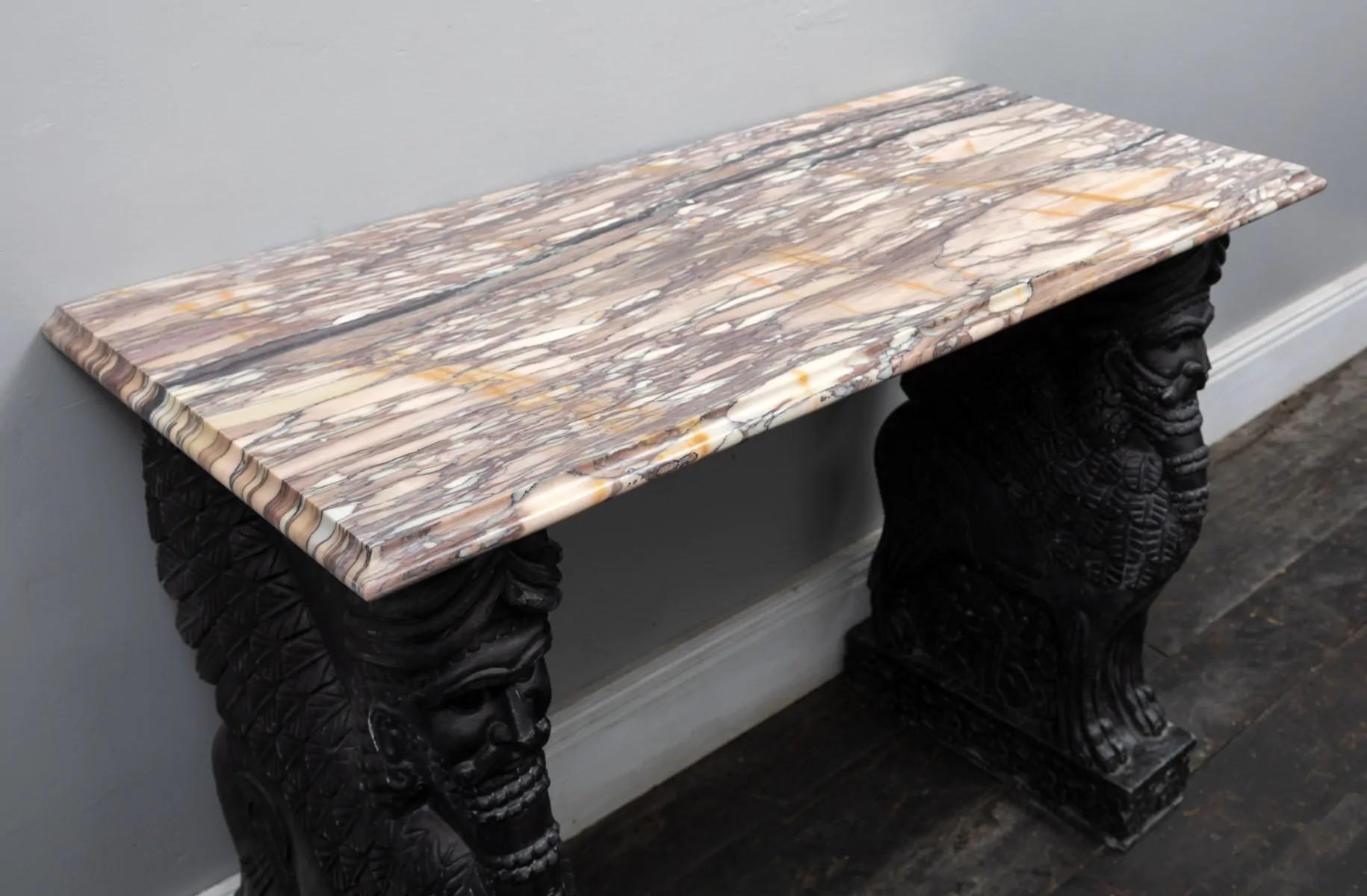Italian Pair of carved black marble and coloured Medicea Siena marble topped console's For Sale