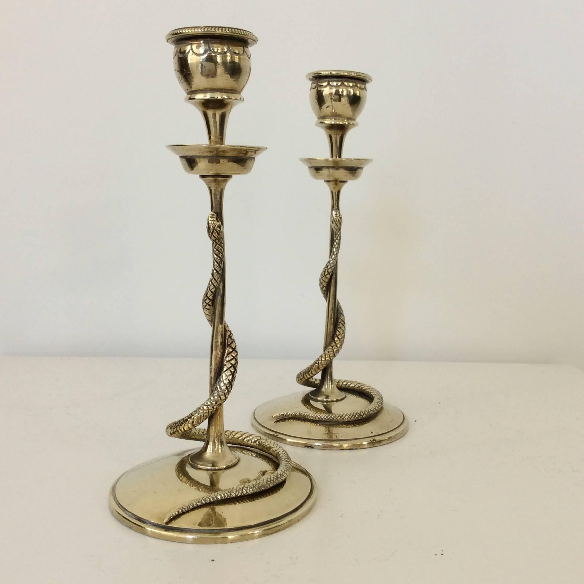 Elegant pair of carved brass snake candleholders, circa 1930, France.
Dimensions: 19 cm height, diameter 9 cm.
Good condition.