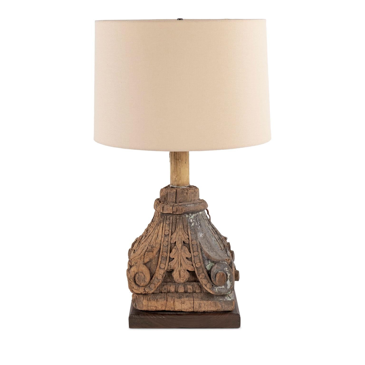 Pair of Carved Capital Table Lamps In Fair Condition For Sale In Houston, TX