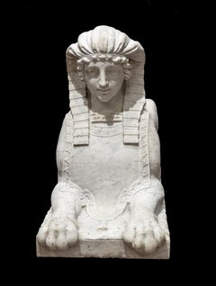 Pair of carved Carrara marble sphinxes