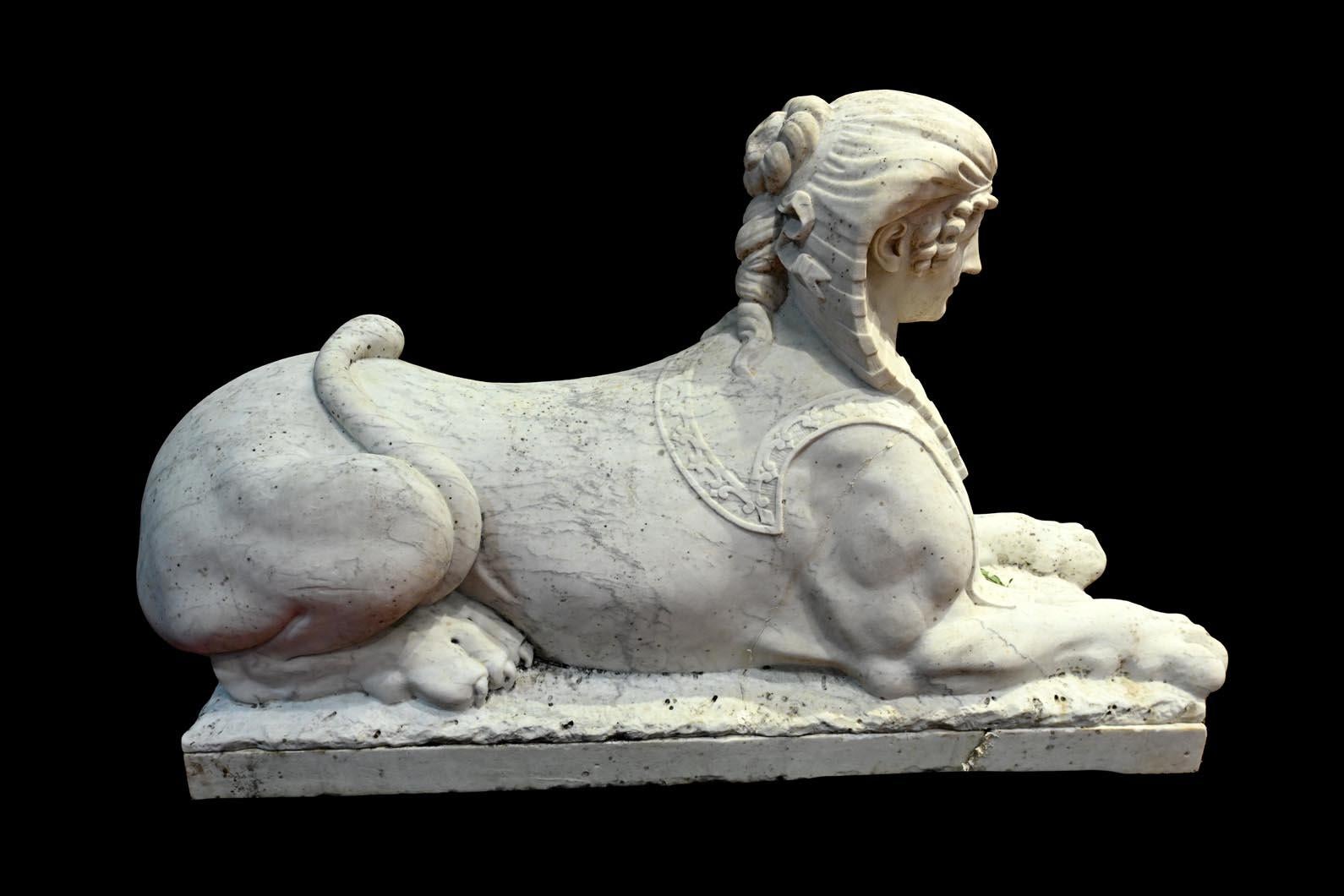 Egyptian Revival Pair of carved Carrara marble sphinxes For Sale