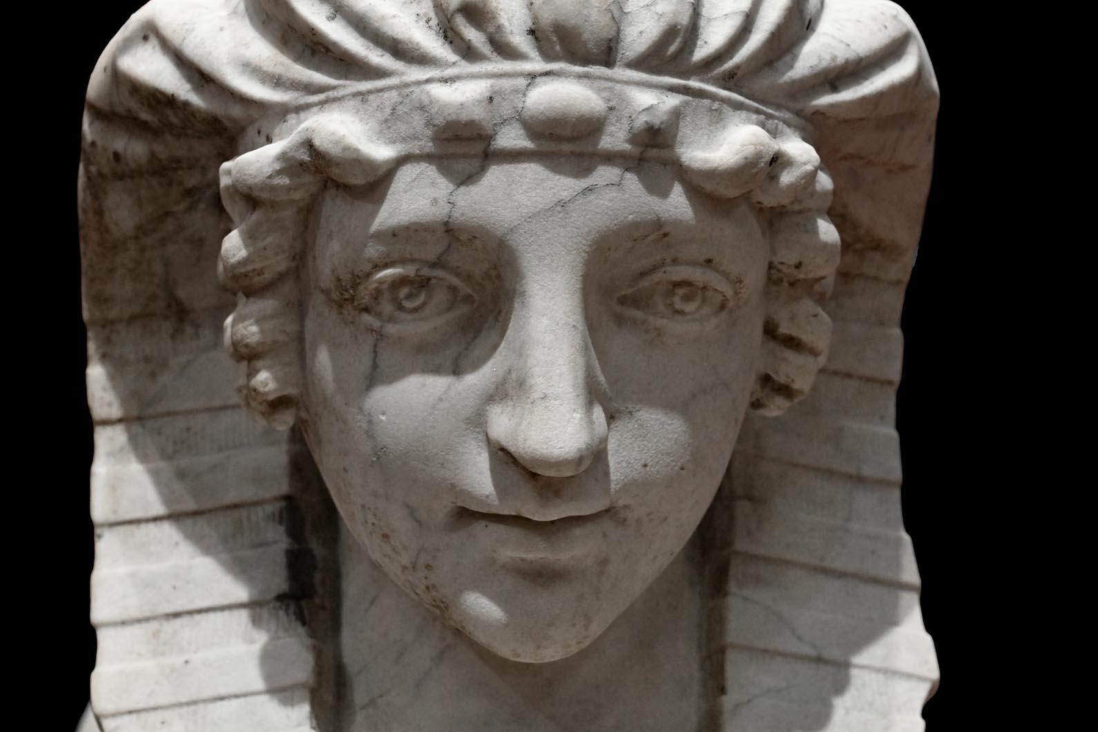 Hand-Carved Pair of carved Carrara marble sphinxes For Sale