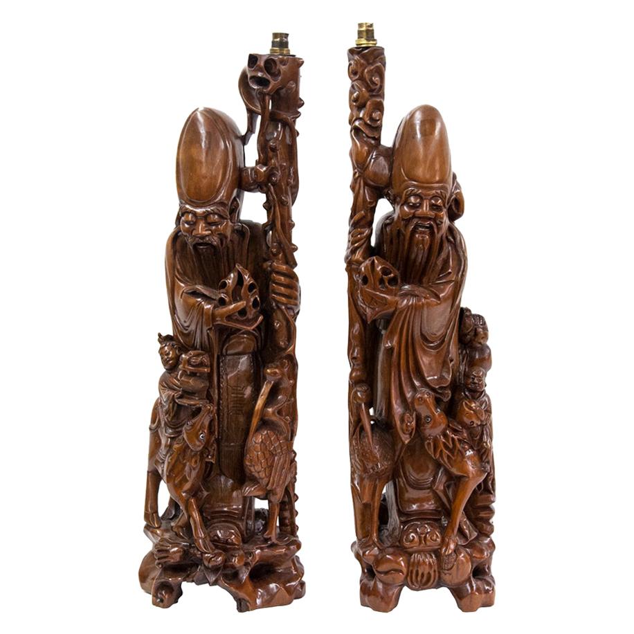 Pair of Carved Chinese Figural Lamps