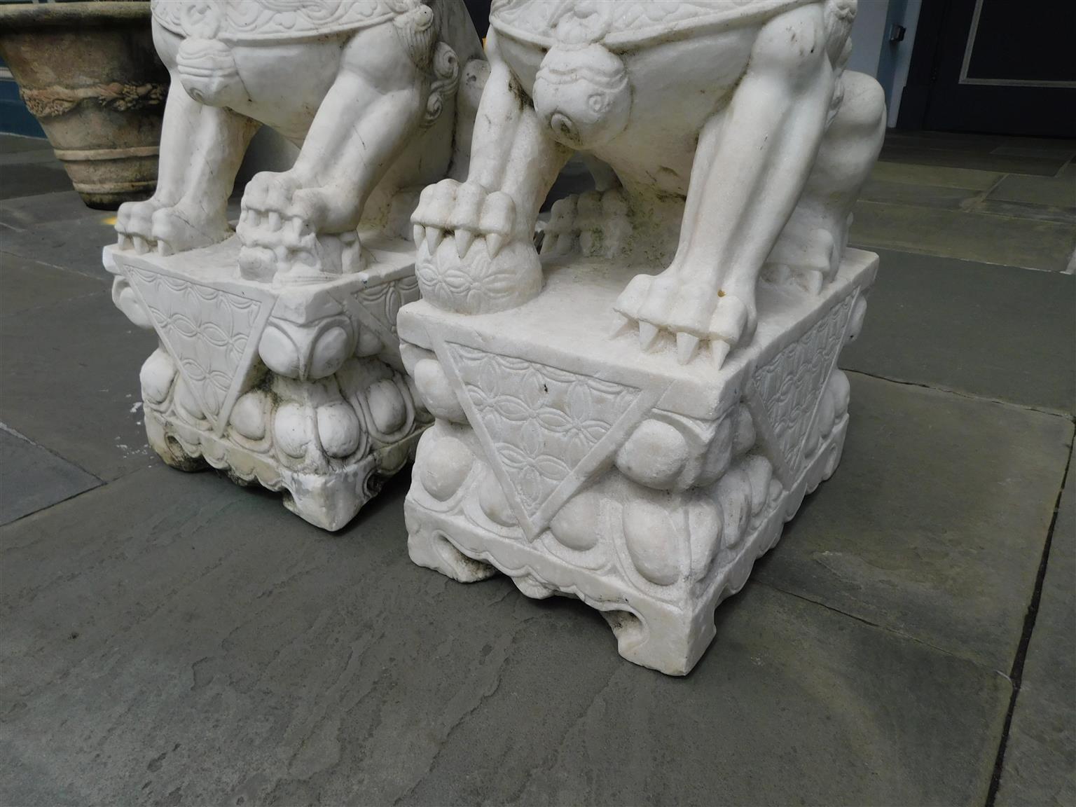 Pair of Chinese Carved Marble Foo Dogs Sitting on Decorative Plinths, 20th Cent 4