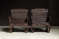 Pair of Carved Chinese Zitan Throne Chairs with Dragon Motifs