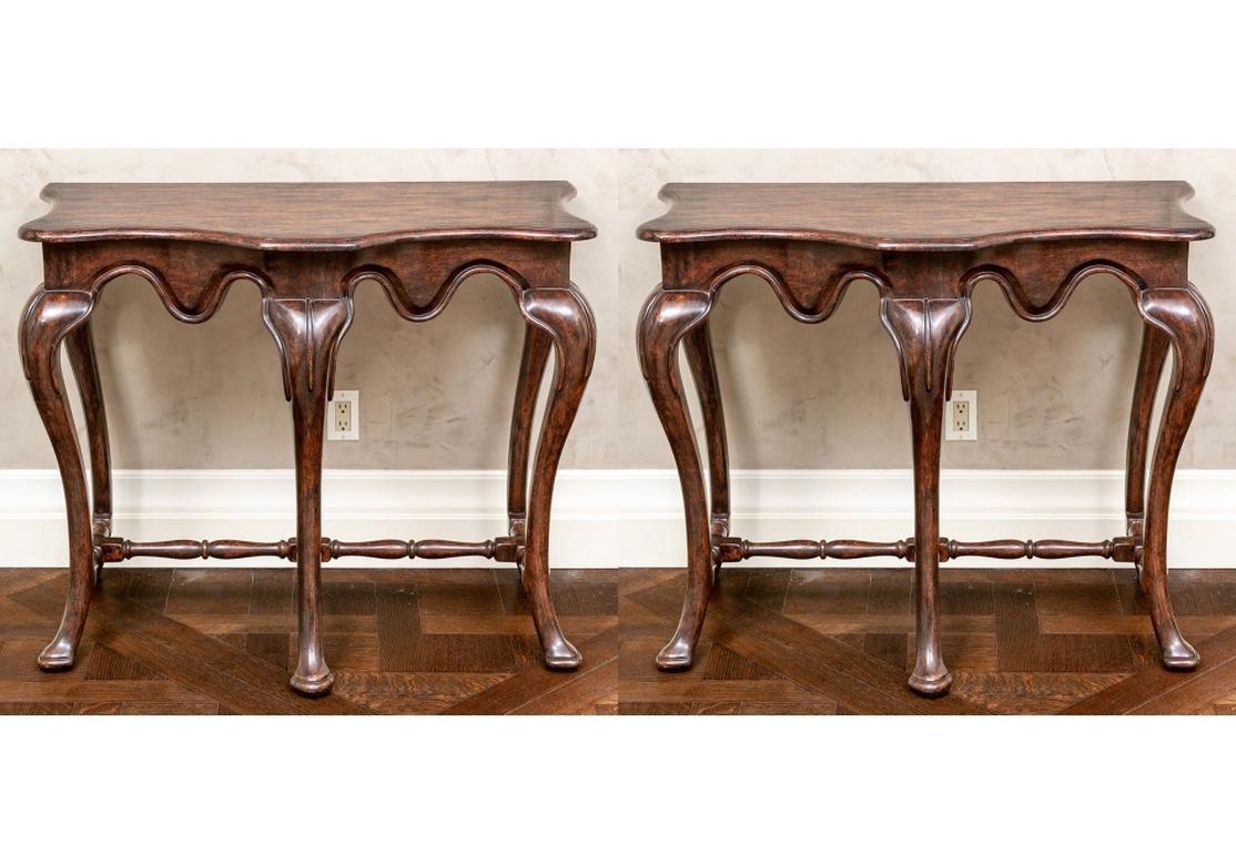 A very well made Console pair in a deep walnut finish by American designer and craftsman David Iatesta. Expert craftsmanship and fine hand-finishing distinguish this outstanding pair of tables. The fine dark mottled brown stain with intentional soft