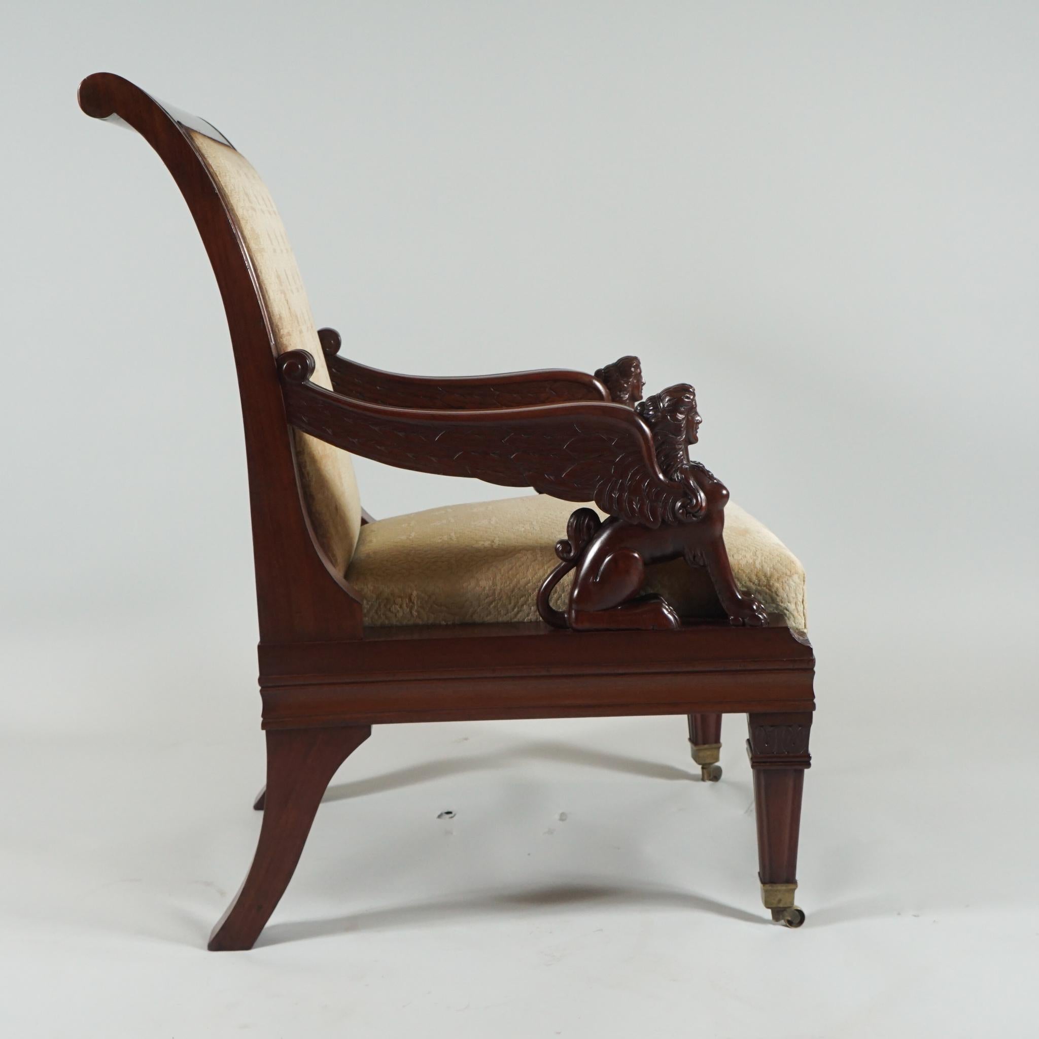 Pair of Carved Egyptian Revival Armchairs In Good Condition For Sale In Hudson, NY
