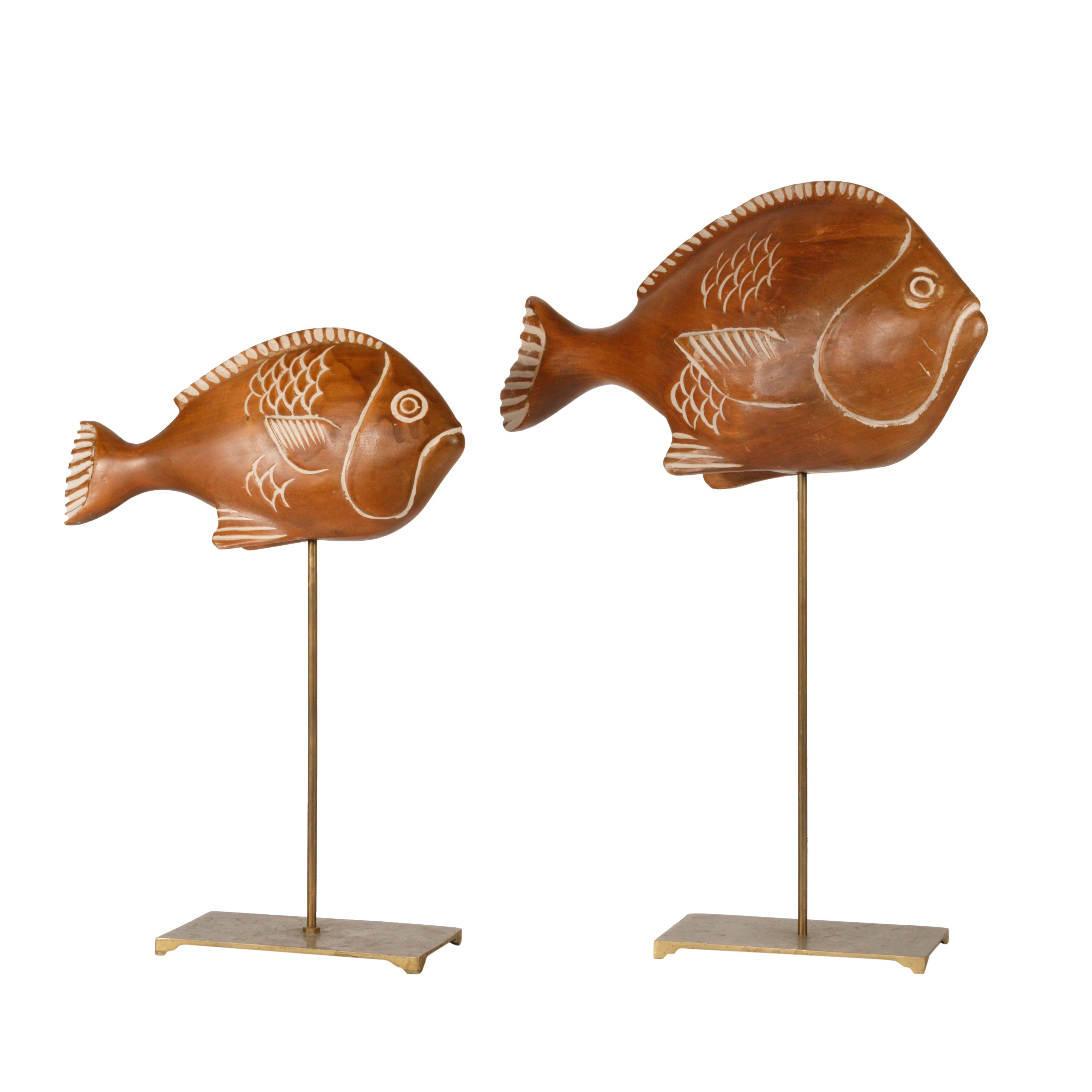 American pair of modern, painted and carved wood fish on brass stand. Both marked, brass base 