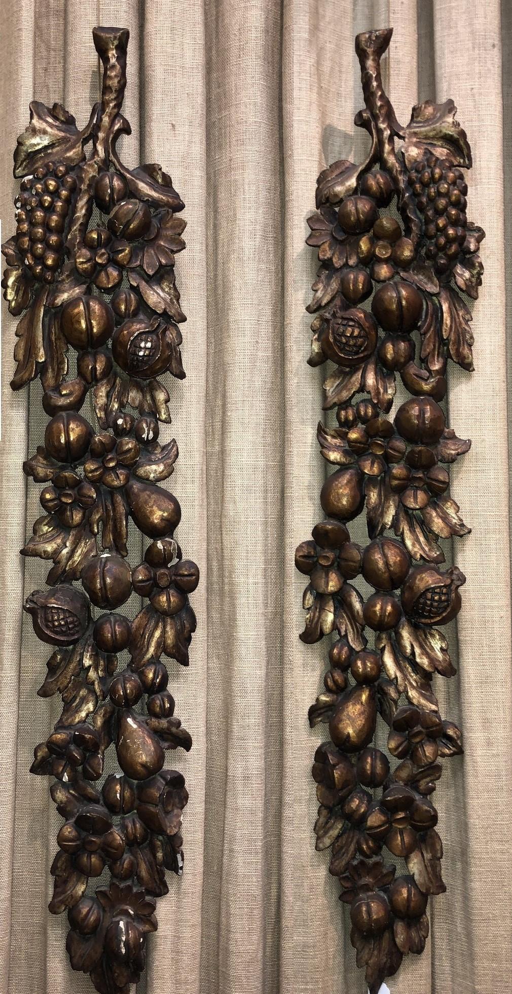 A superb pair of carved gilt wood plaques (left & right). Great detail. 
Dimensions: Height 40