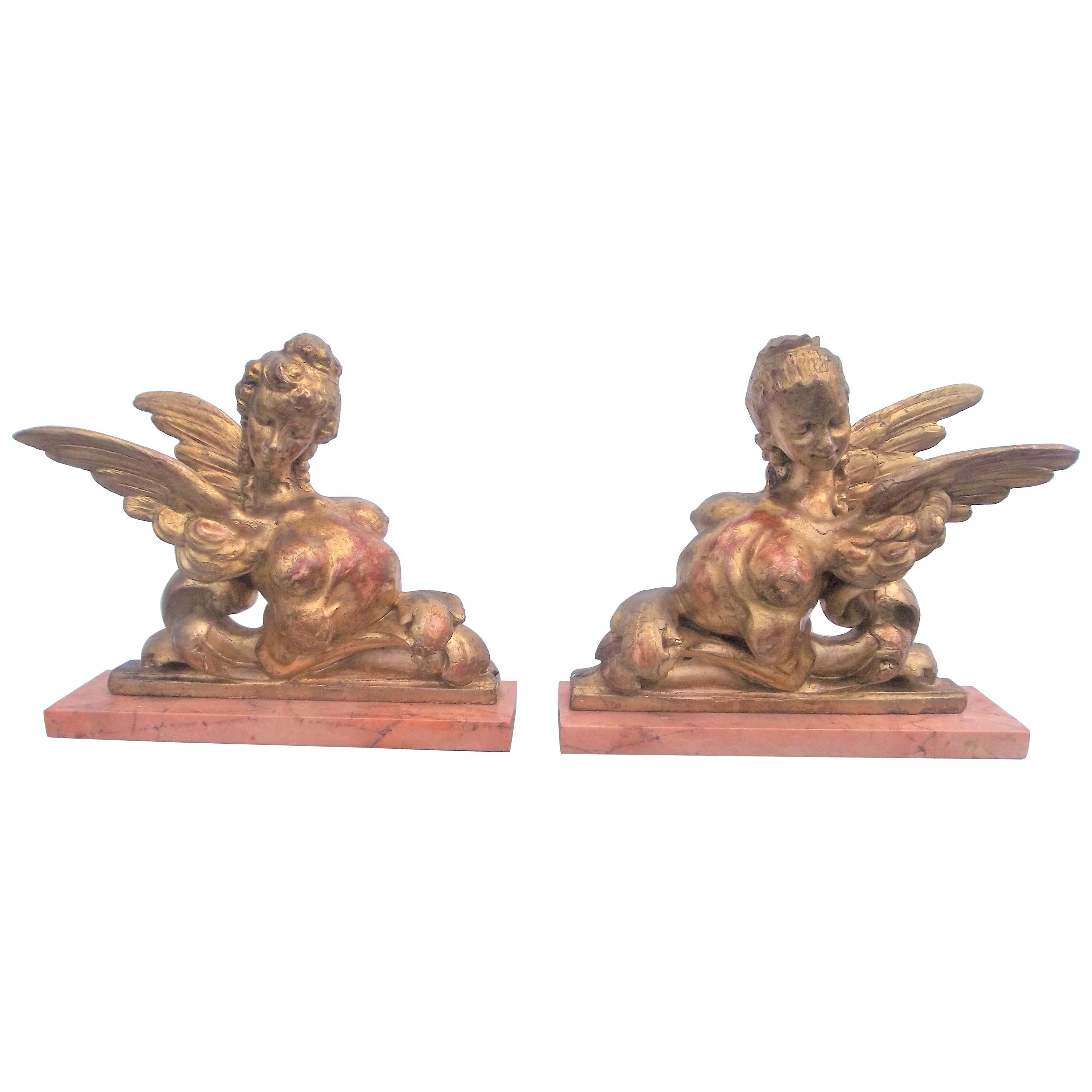 Pair of Carved Giltwood Sphinx Form in Neoclassical Caricature