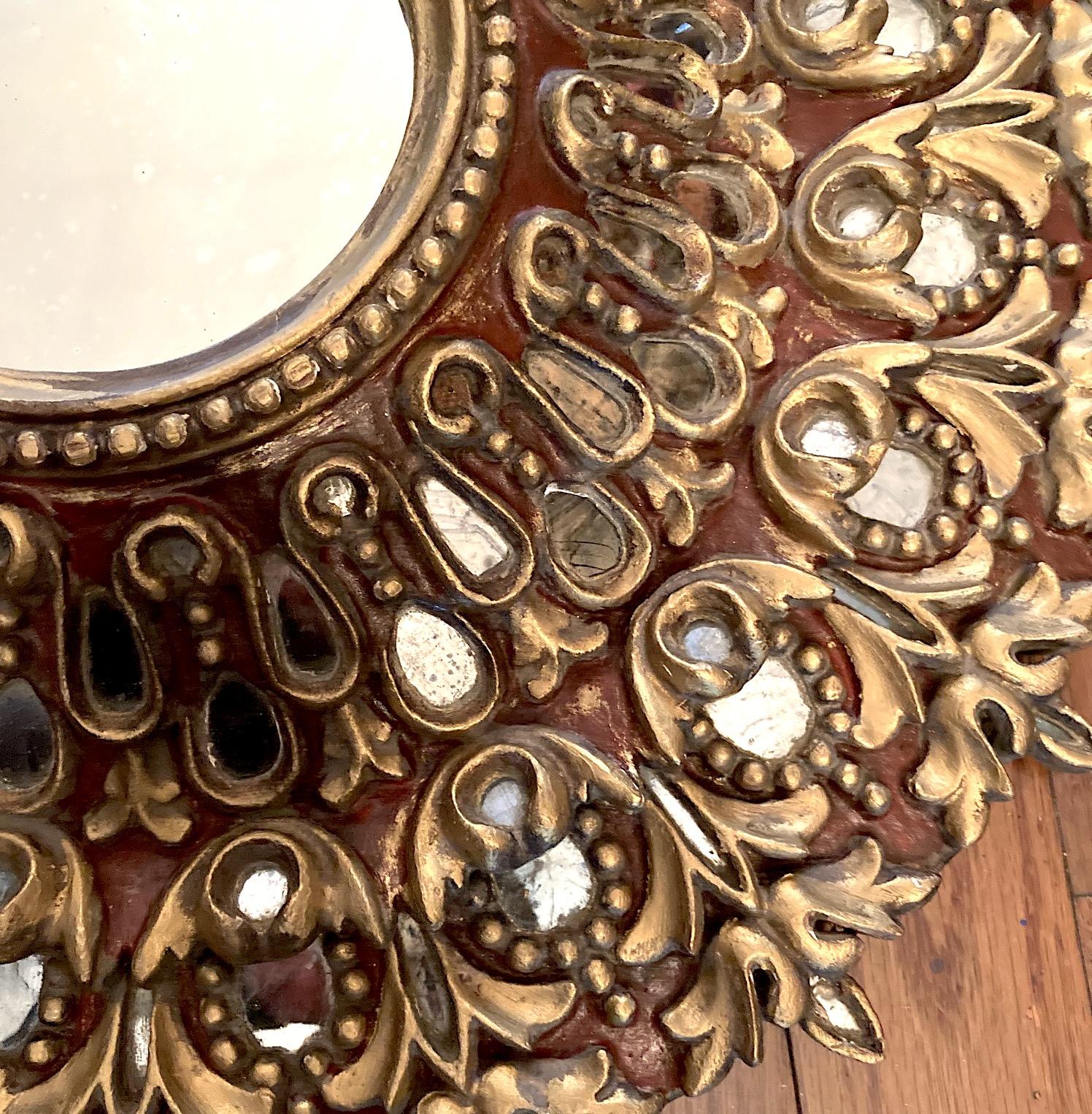 Pair of Carved Giltwood Sunburst Mirrors. Sold individually In Good Condition For Sale In New York, NY