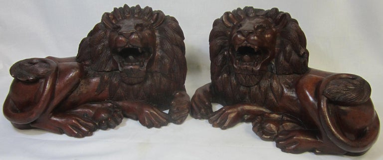 Pair of Carved Hard Wood African Lions For Sale at 1stDibs