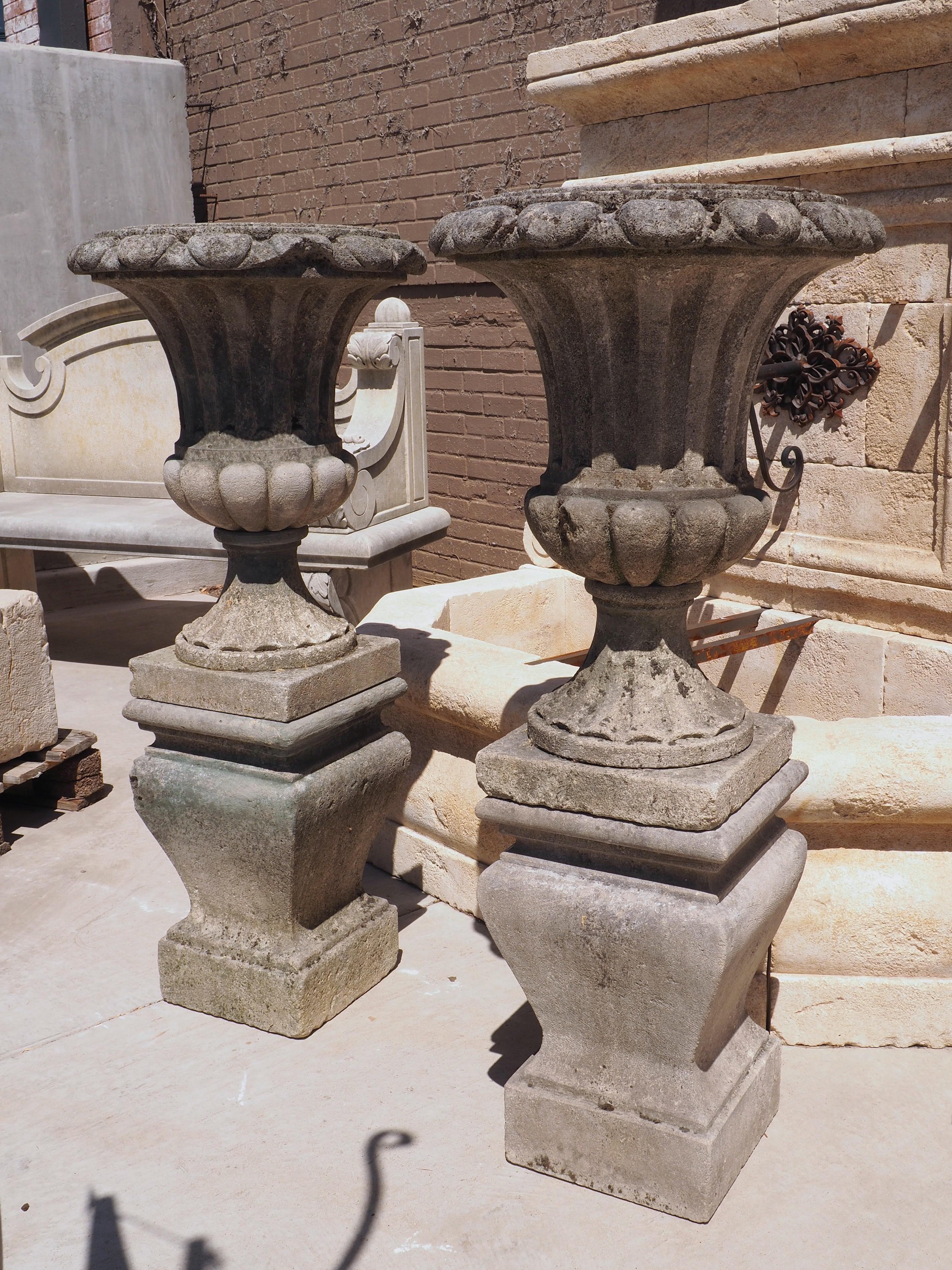 Pair of Carved Italian Limestone Vases on Pedestals, Circa 1960s In Good Condition In Dallas, TX