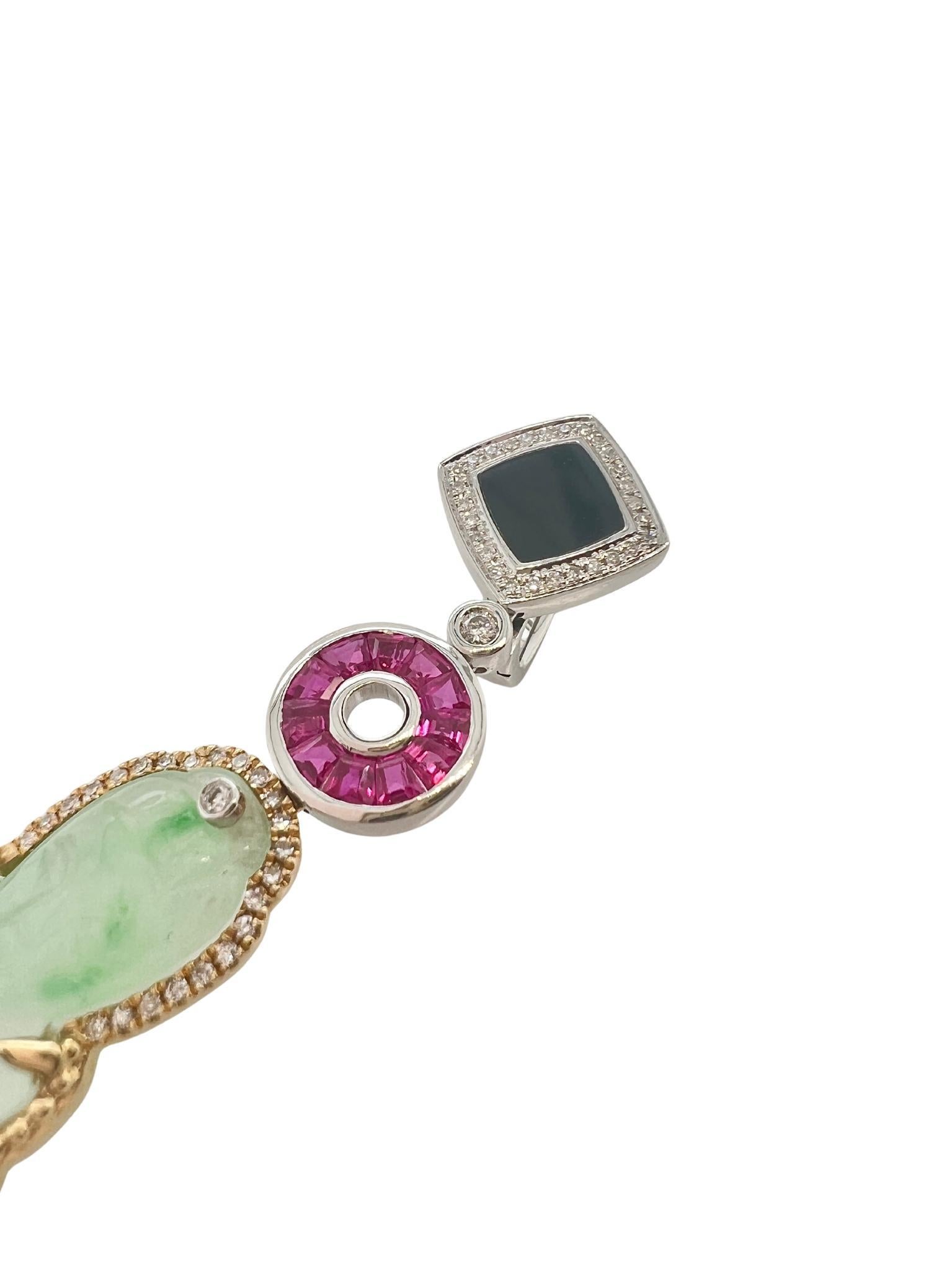 Mixed Cut Pair of Carved Jade, Two-Color Gold, Ruby, Onyx, and Diamond Pendant Earrings For Sale
