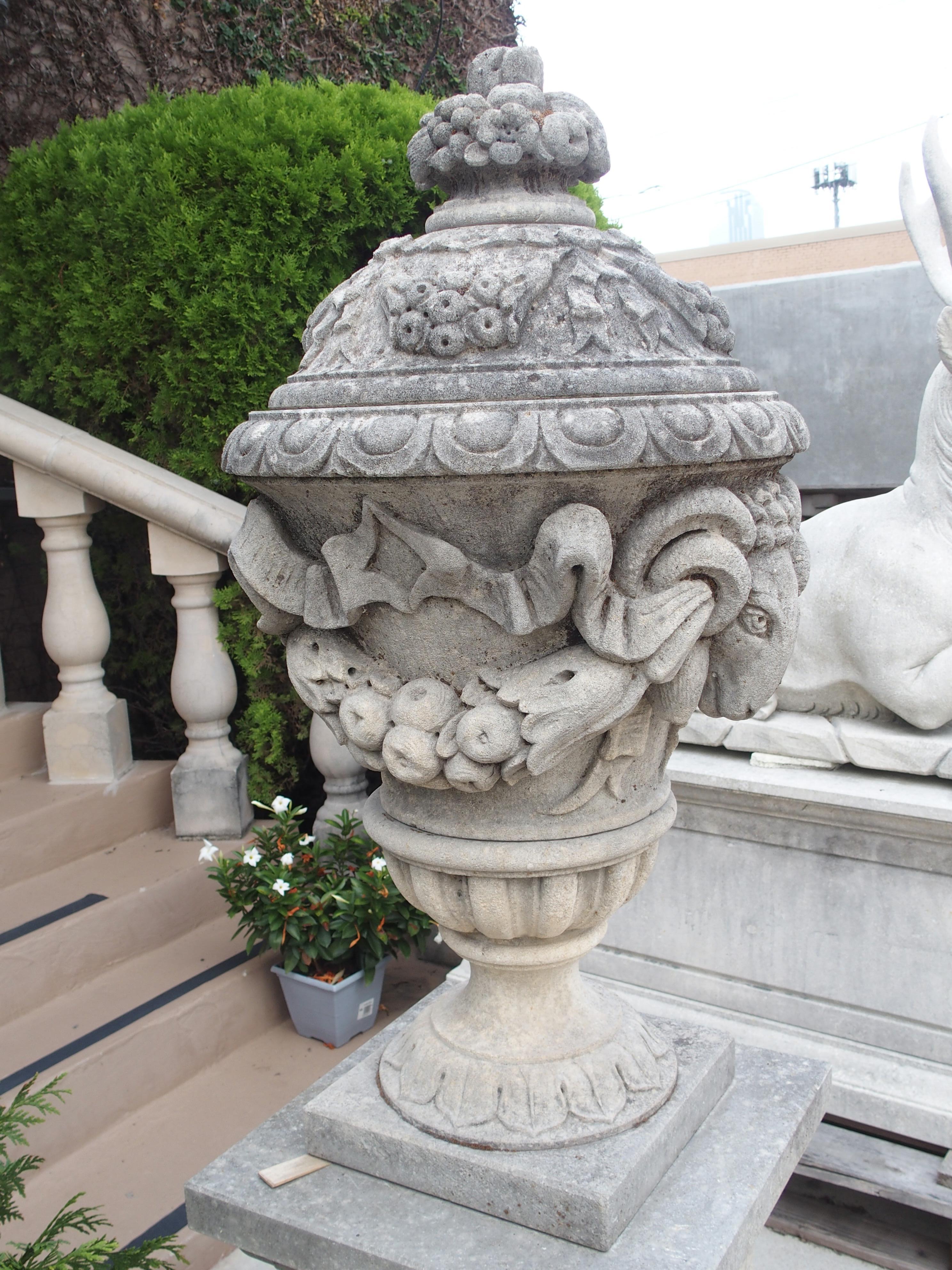Contemporary Pair of Carved Limestone Ram Heads Vases on Pedestals