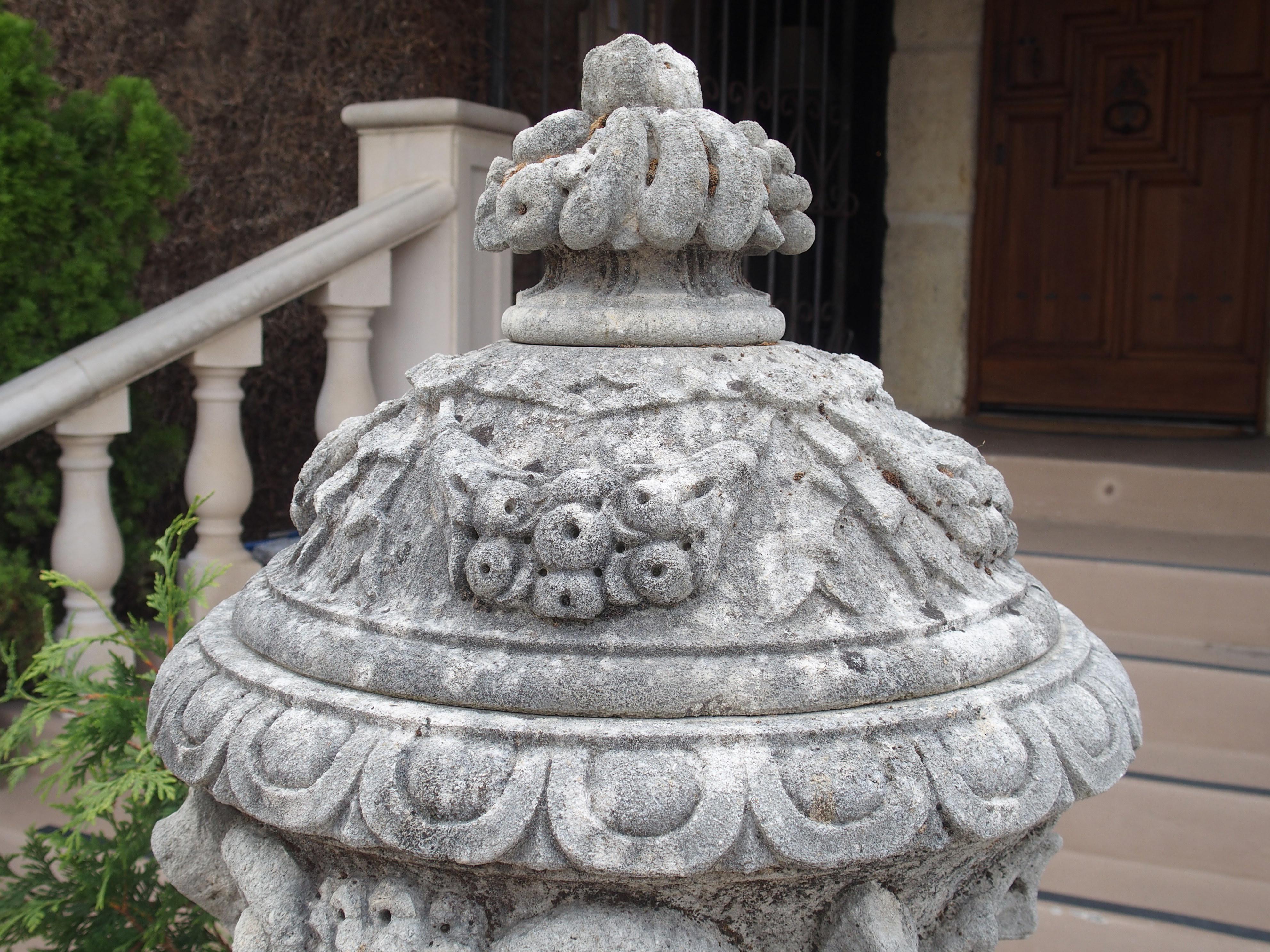 Pair of Carved Limestone Ram Heads Vases on Pedestals 2