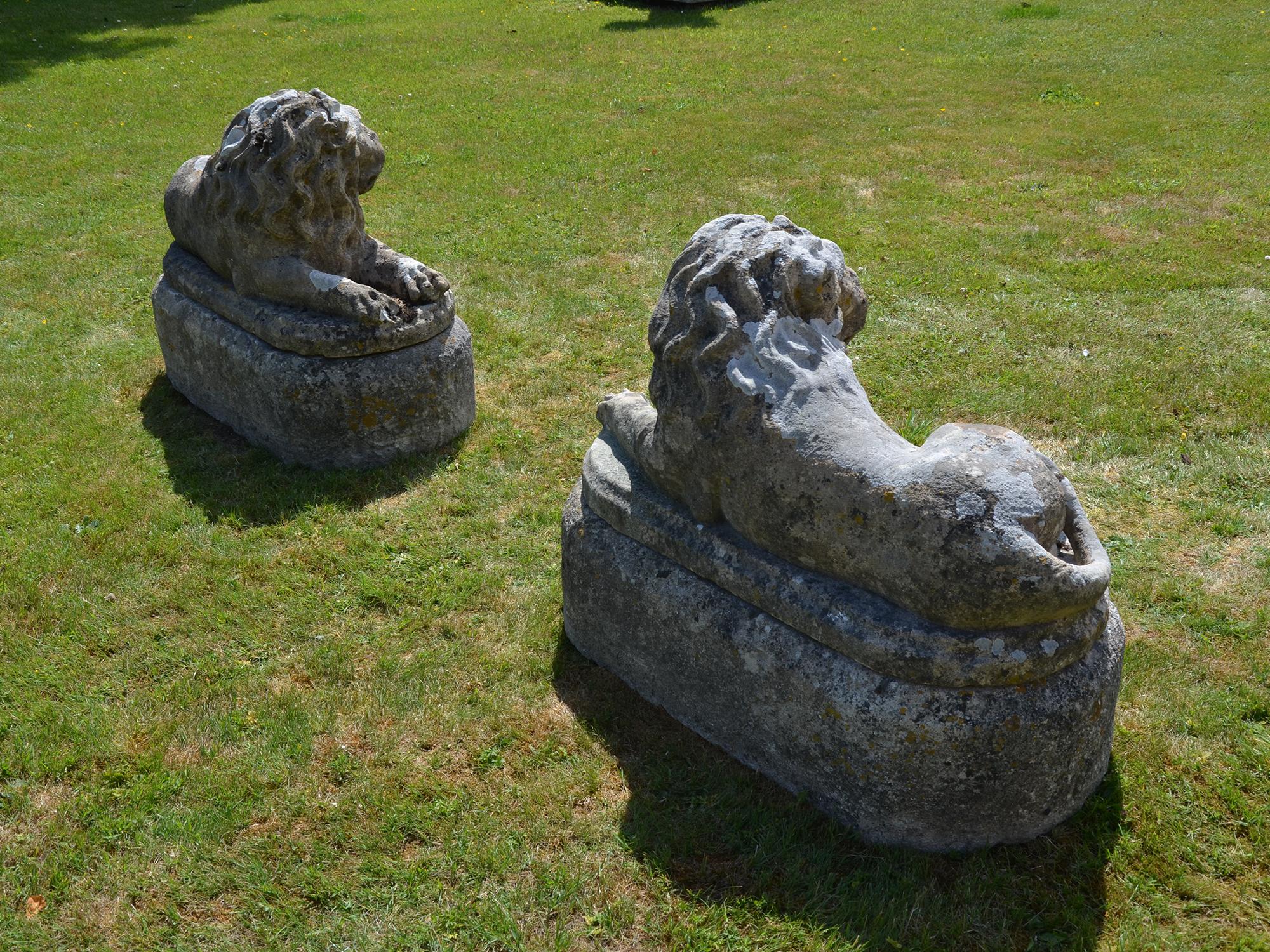 Pair of Carved Limestone Recumbent Lions For Sale 1