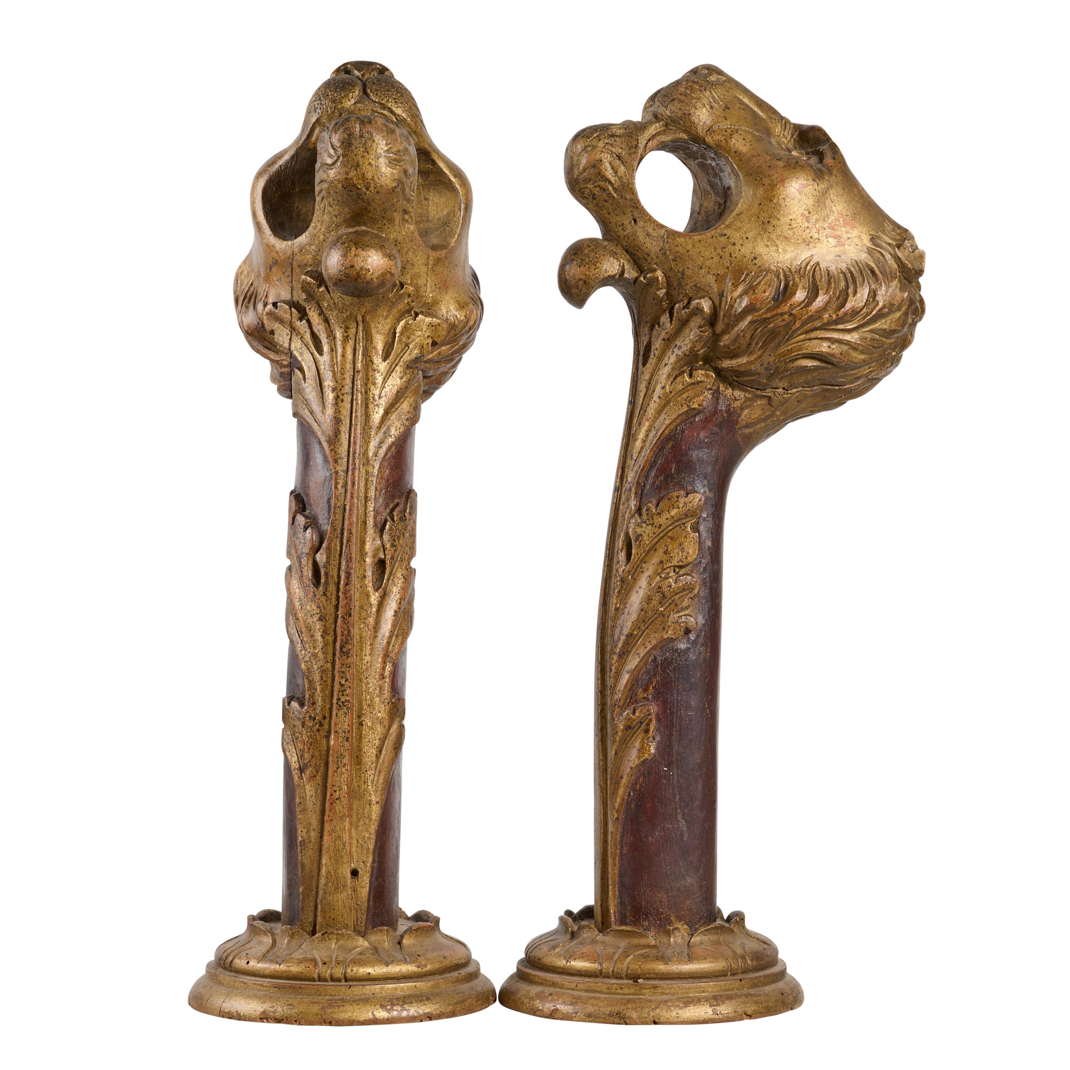Pair of carved lion head curtain rod brackets - excellent patina. 