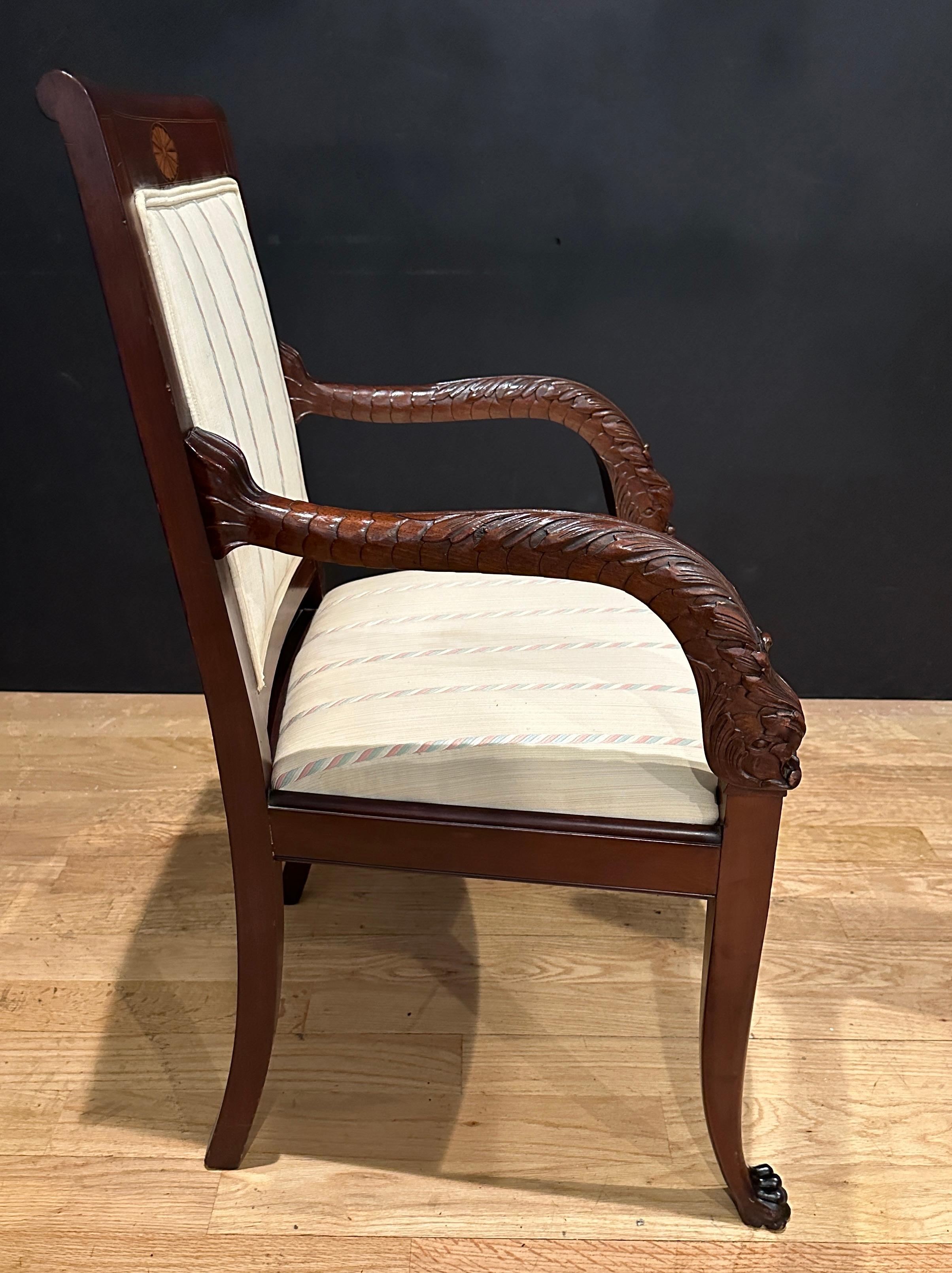 American Pair Of Carved Mahogany Dolphin Form Armchairs For Sale