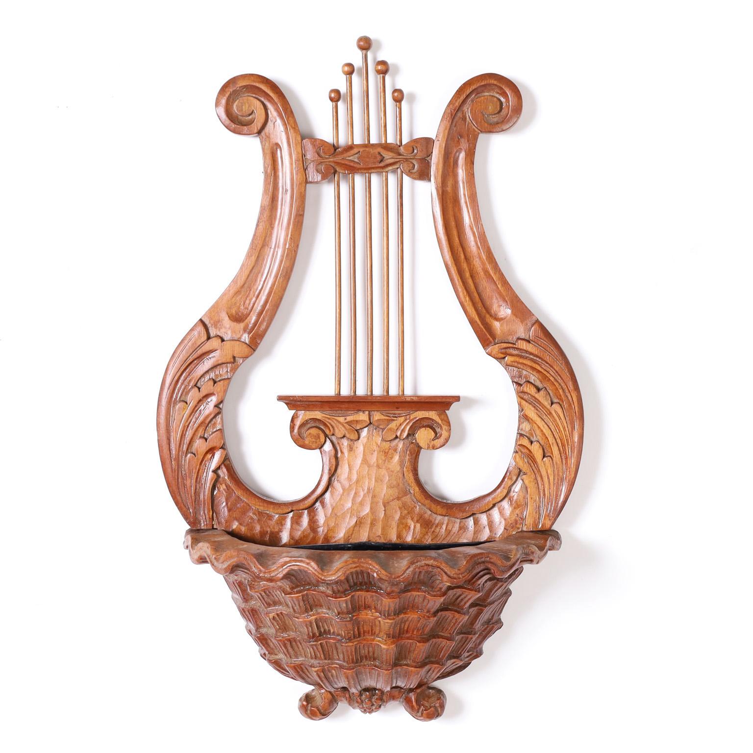 Pair of Carved Mahogany Lyre Form Wall Sconces In Good Condition For Sale In Palm Beach, FL
